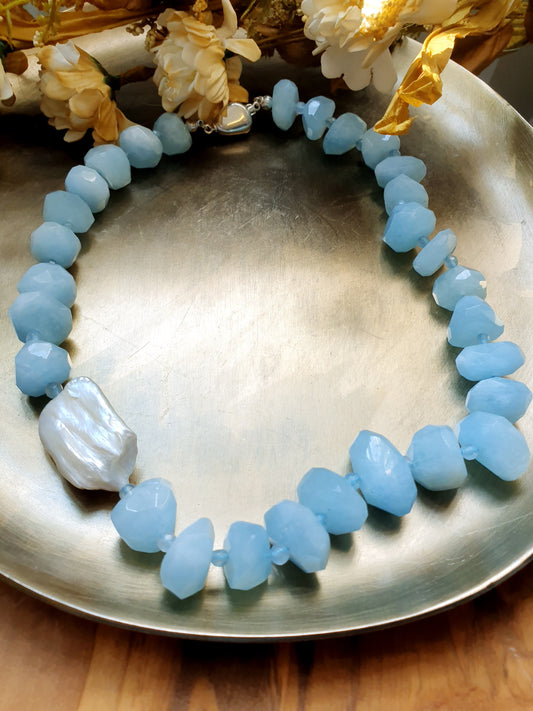 Silver necklace with aquamarine and baroque pearl.