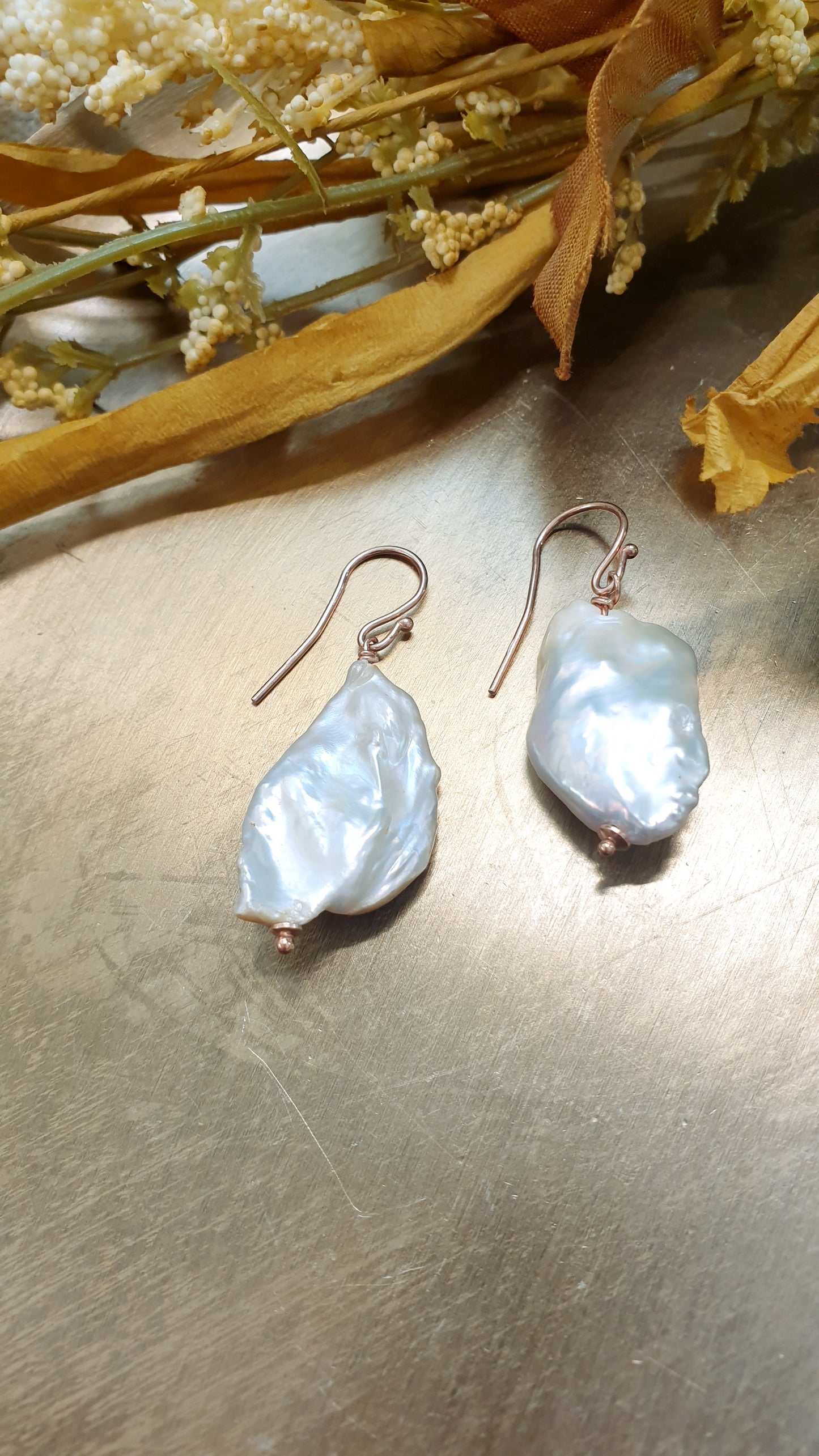 Orecchini in argento 925 rosato con perla barocca