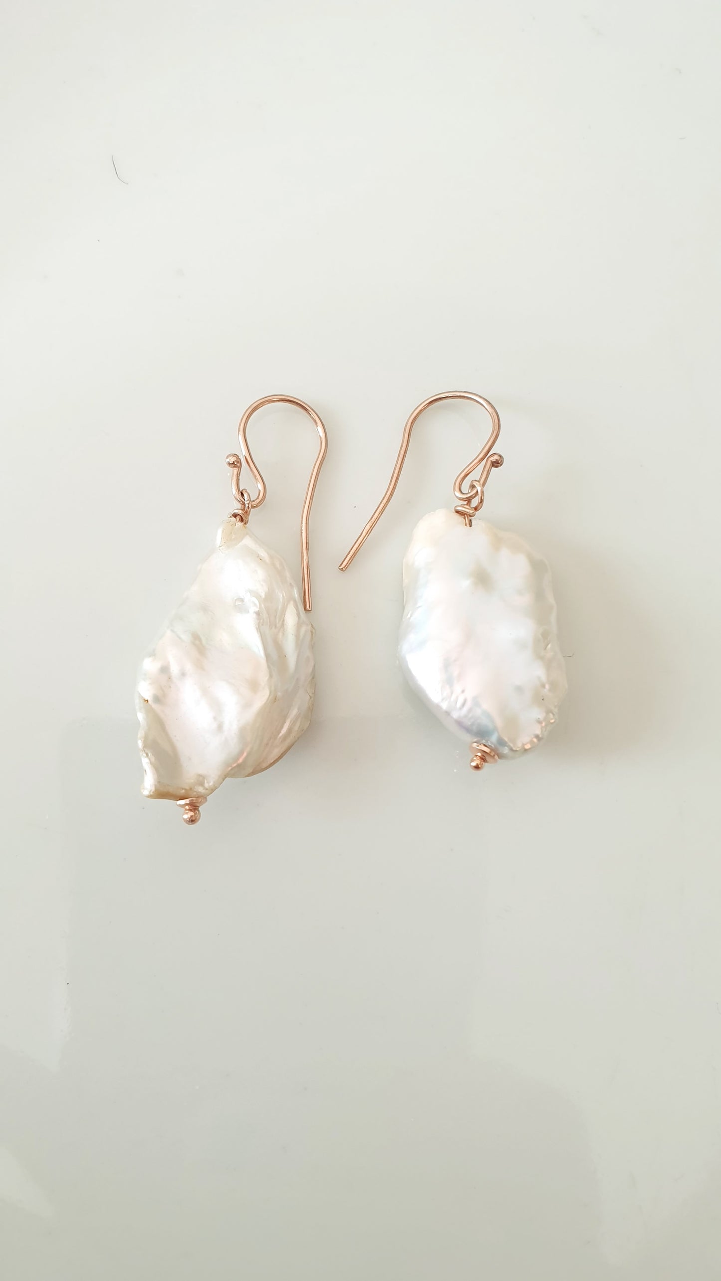 Orecchini in argento 925 rosato con perla barocca