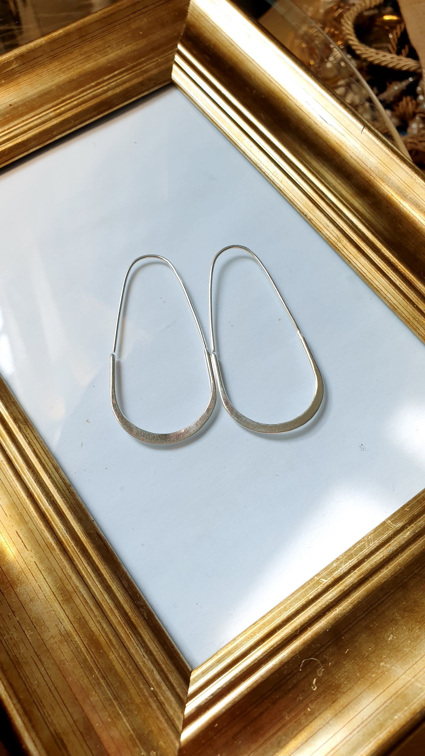 Orecchini pendenti in ottone argentato