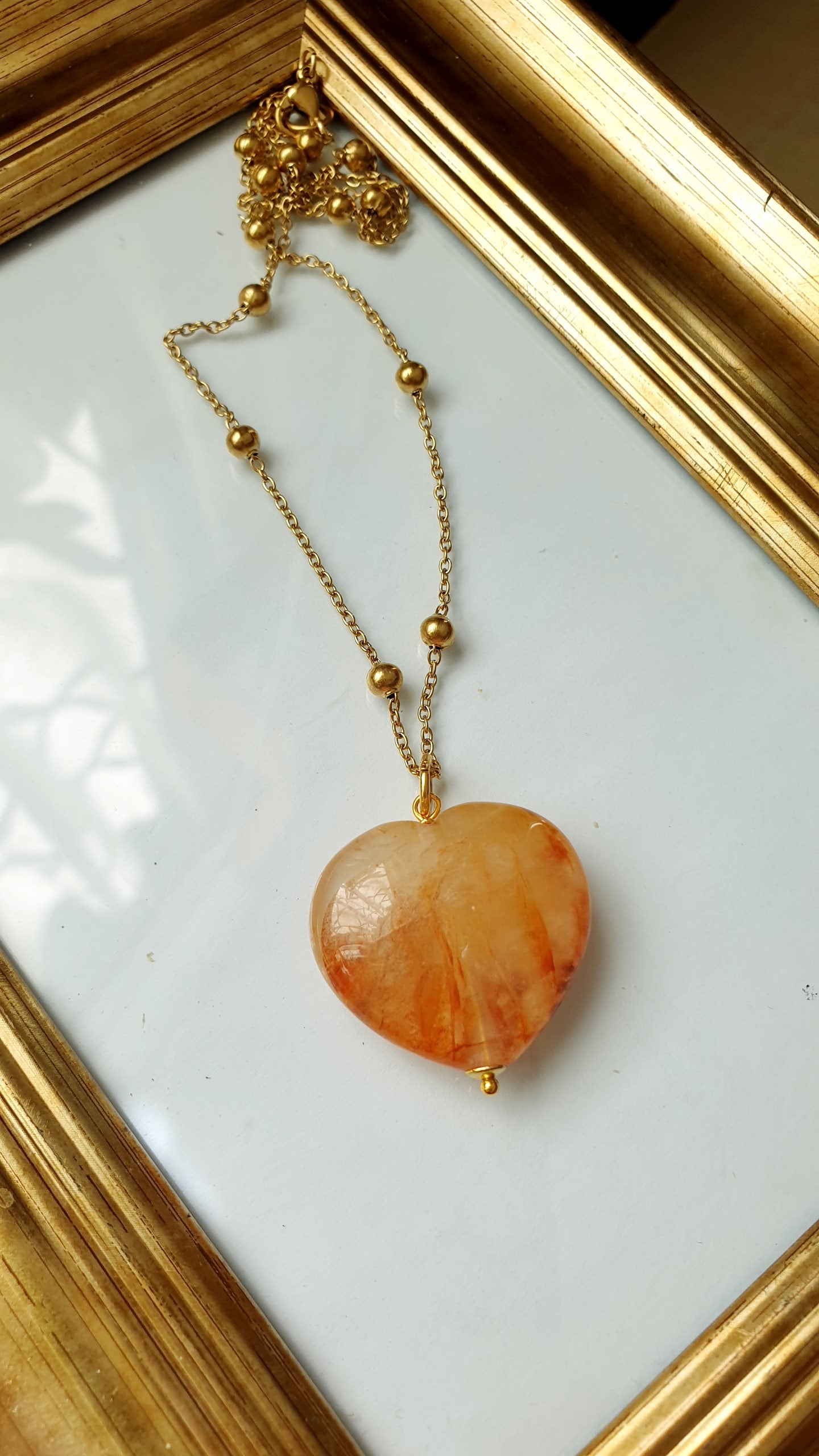 Collana in acciaio con cuore di quarzo