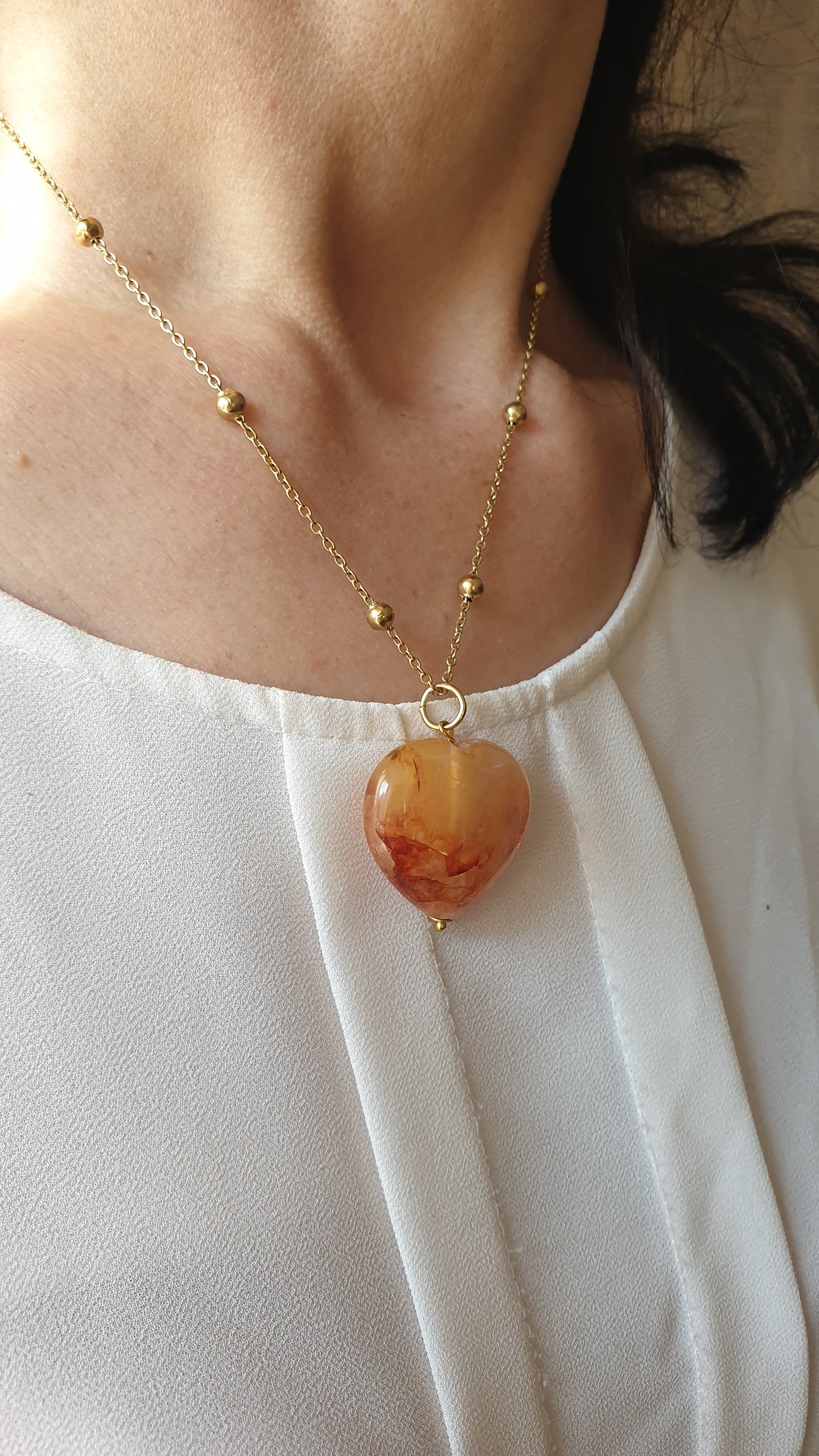 Collana in acciaio con cuore di quarzo