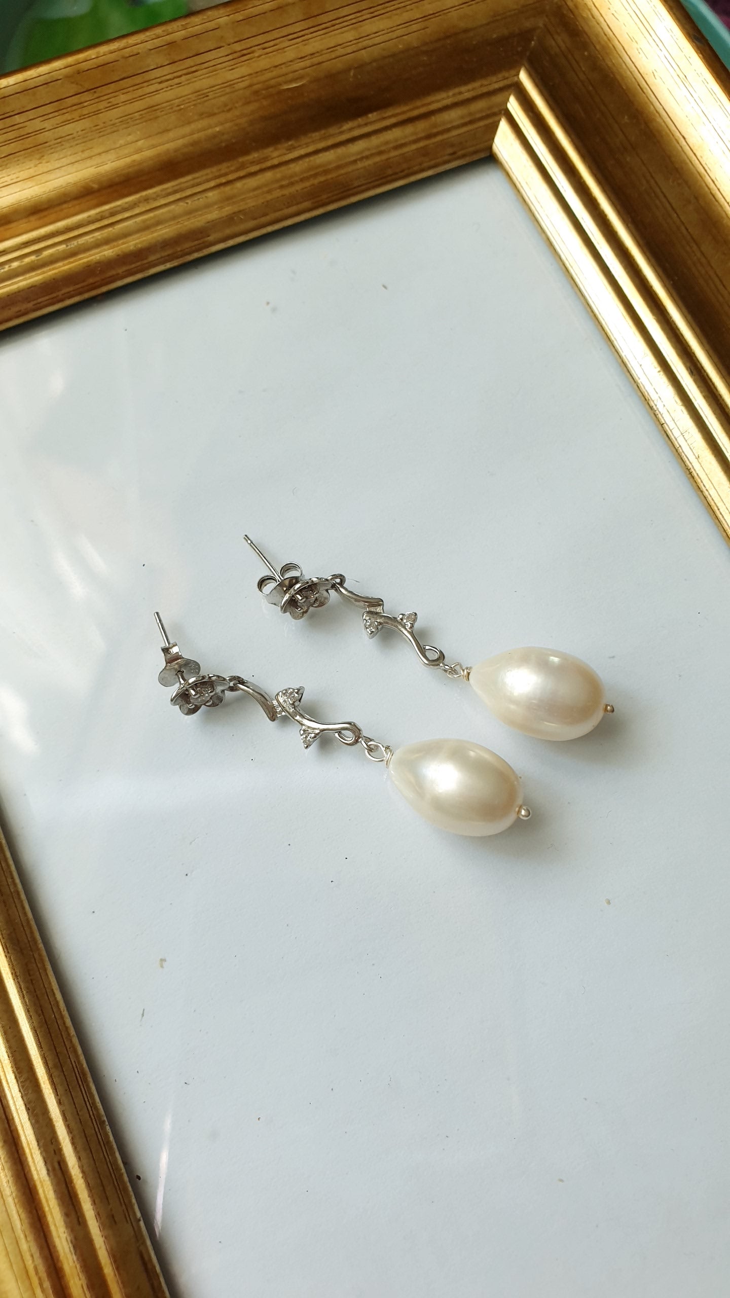 Orecchini in argento e zirconi con perle