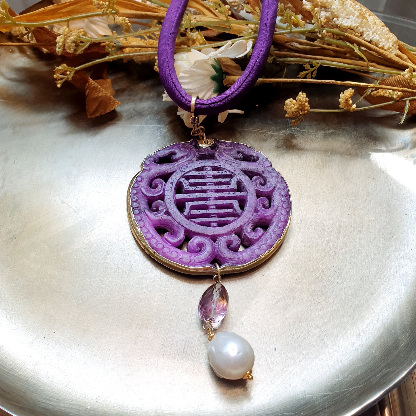 Collana con ciondolo mala