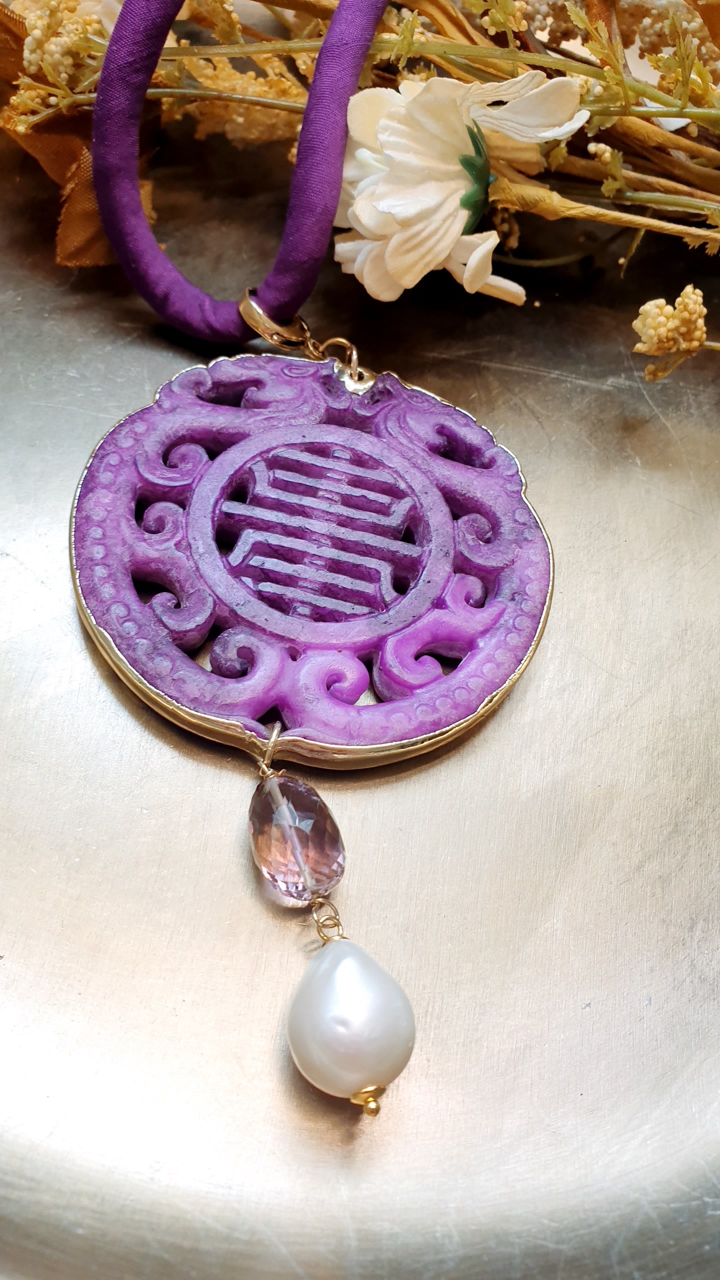Collana con ciondolo mala