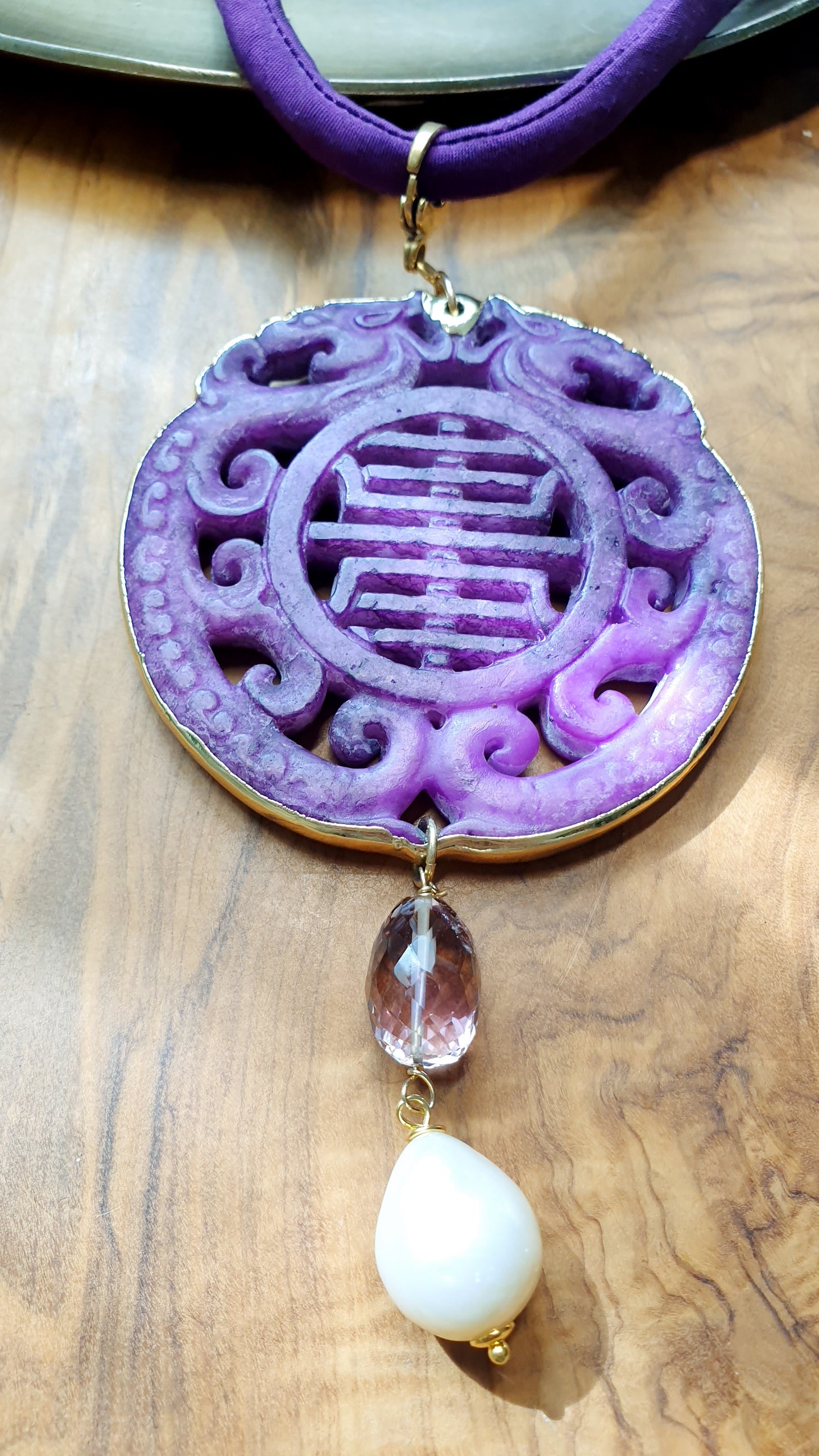 Collana con ciondolo mala
