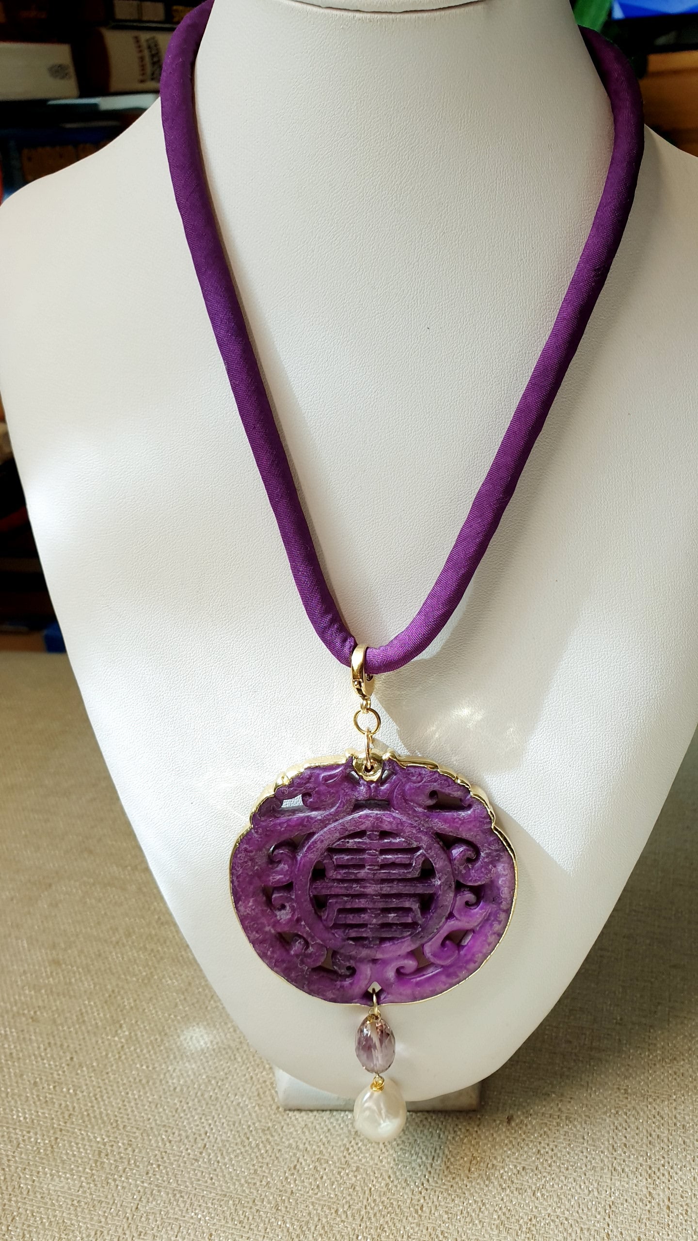 Collana con ciondolo mala