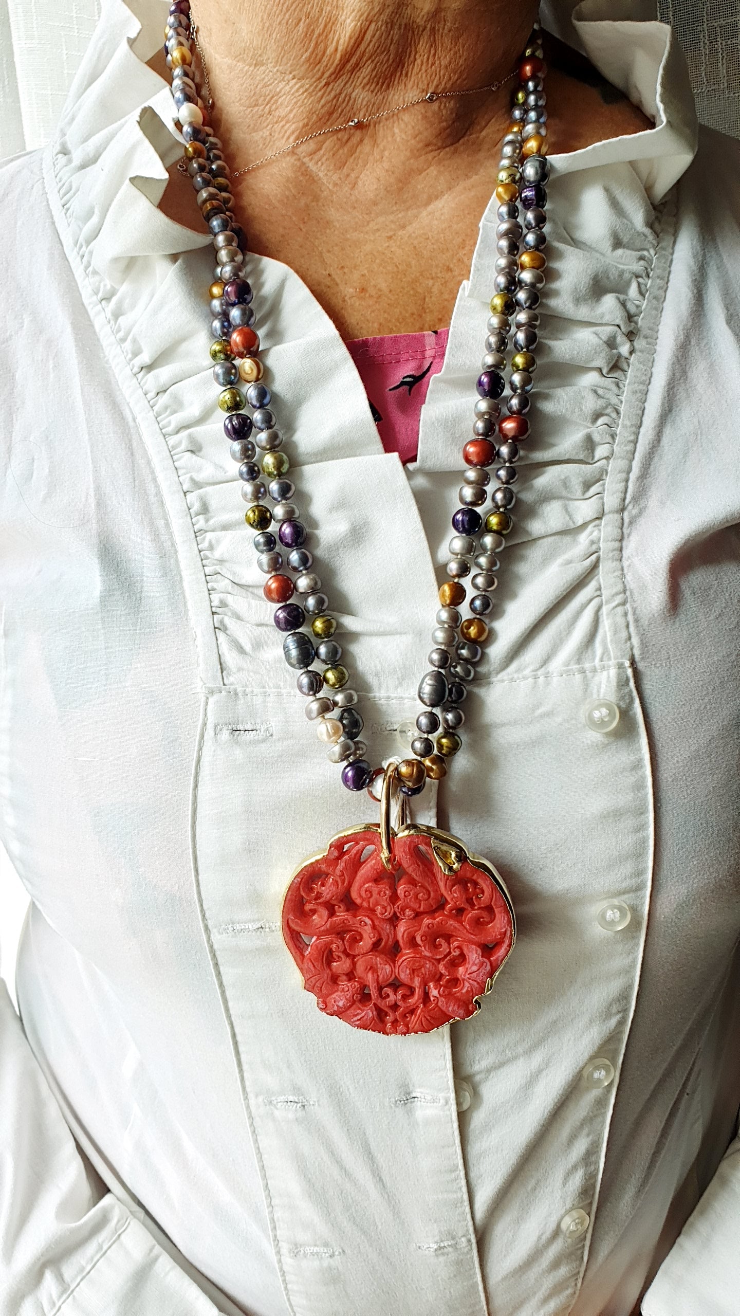 Lunga collana di perle con giada