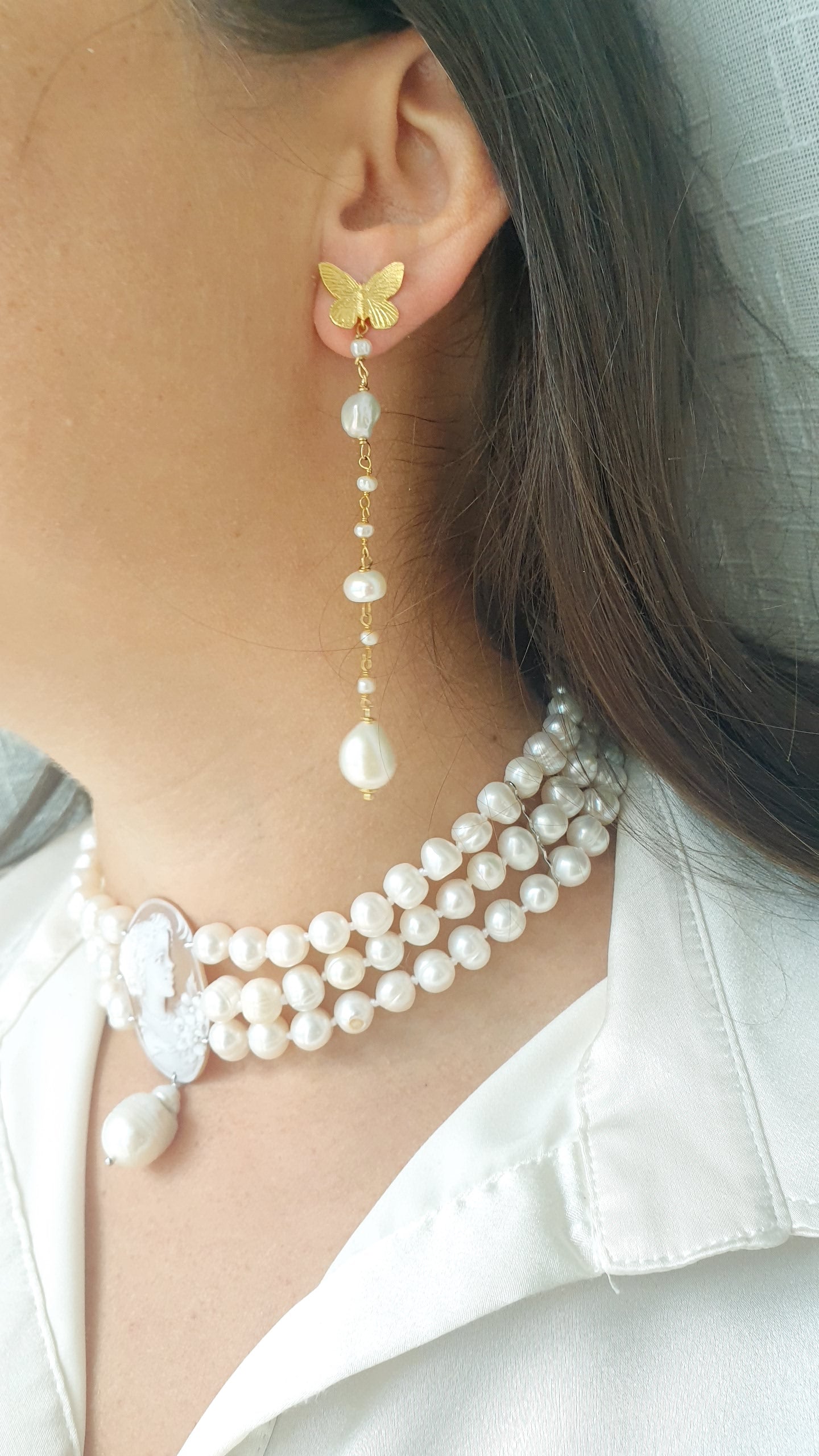 Lunghi orecchini in argento con perle