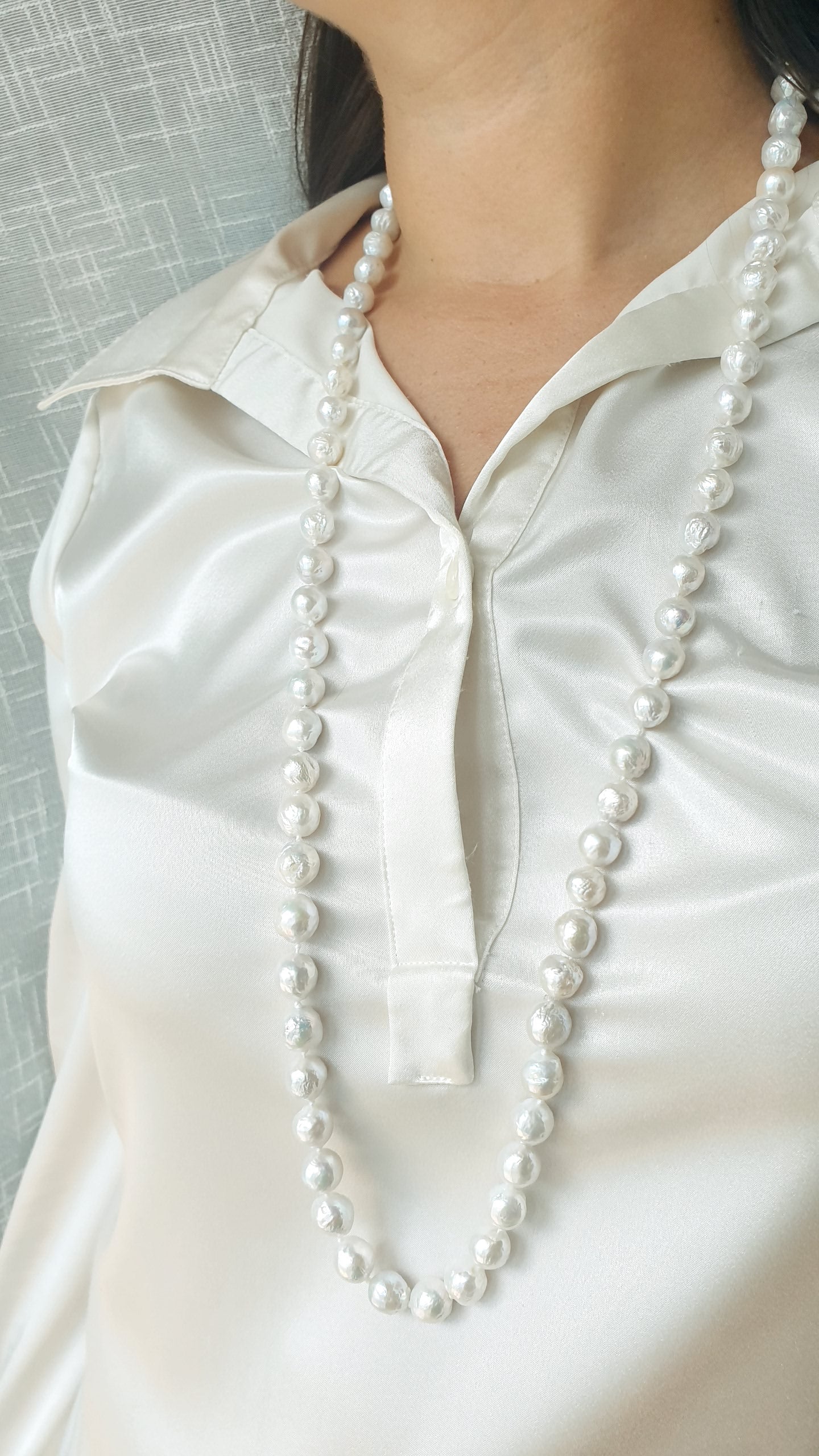 Lunga collana in perle barocche