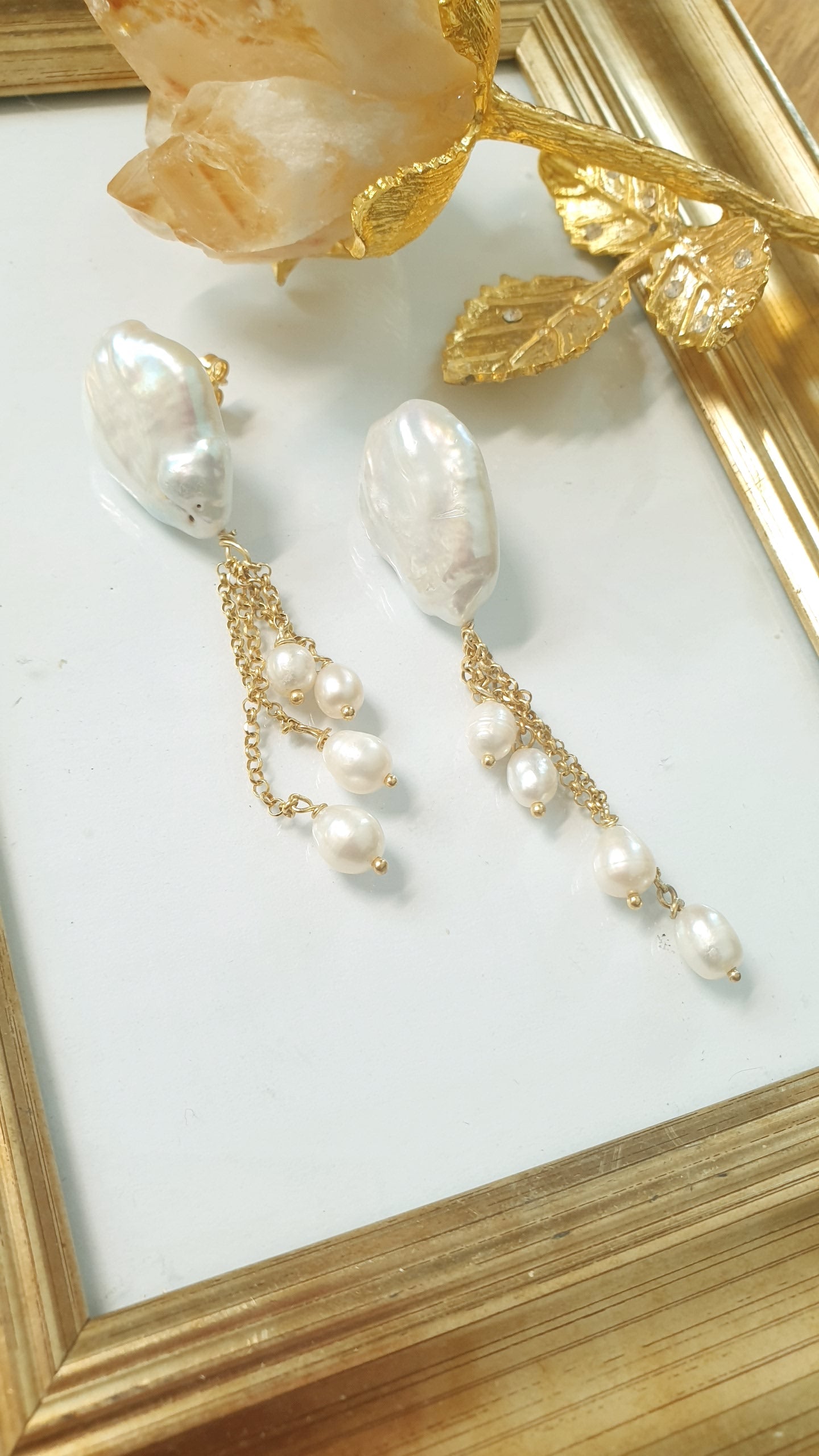 Orecchini in argento con perle barocche e perle di fiume