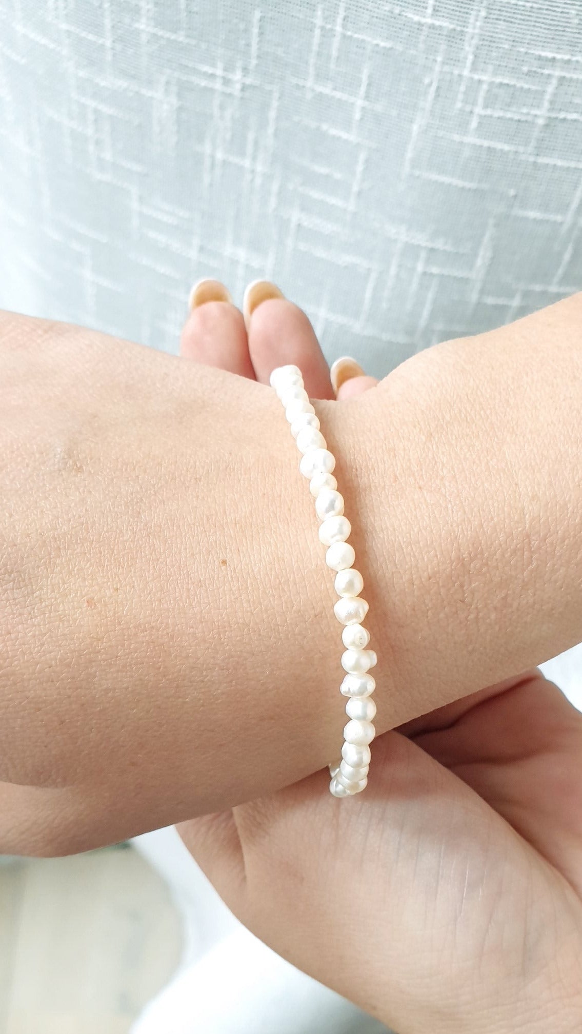 Bracciale di perle di fiume con chiusura di argento