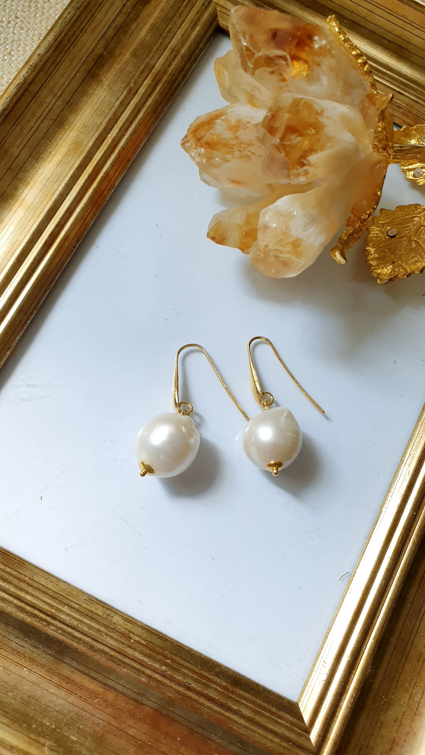 Orecchini in argento con perla barocca