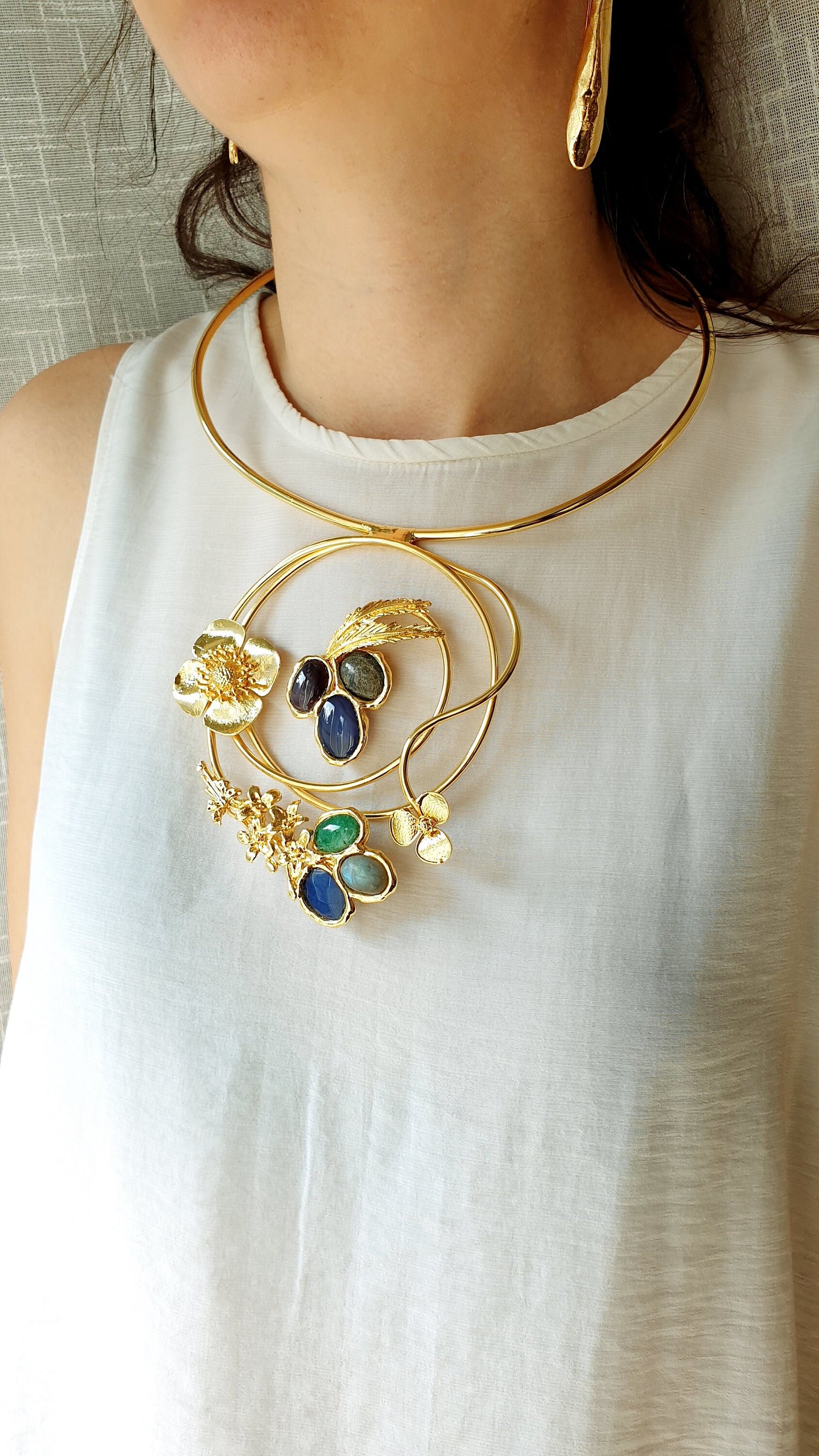 Gold plated necklace with hard stones.