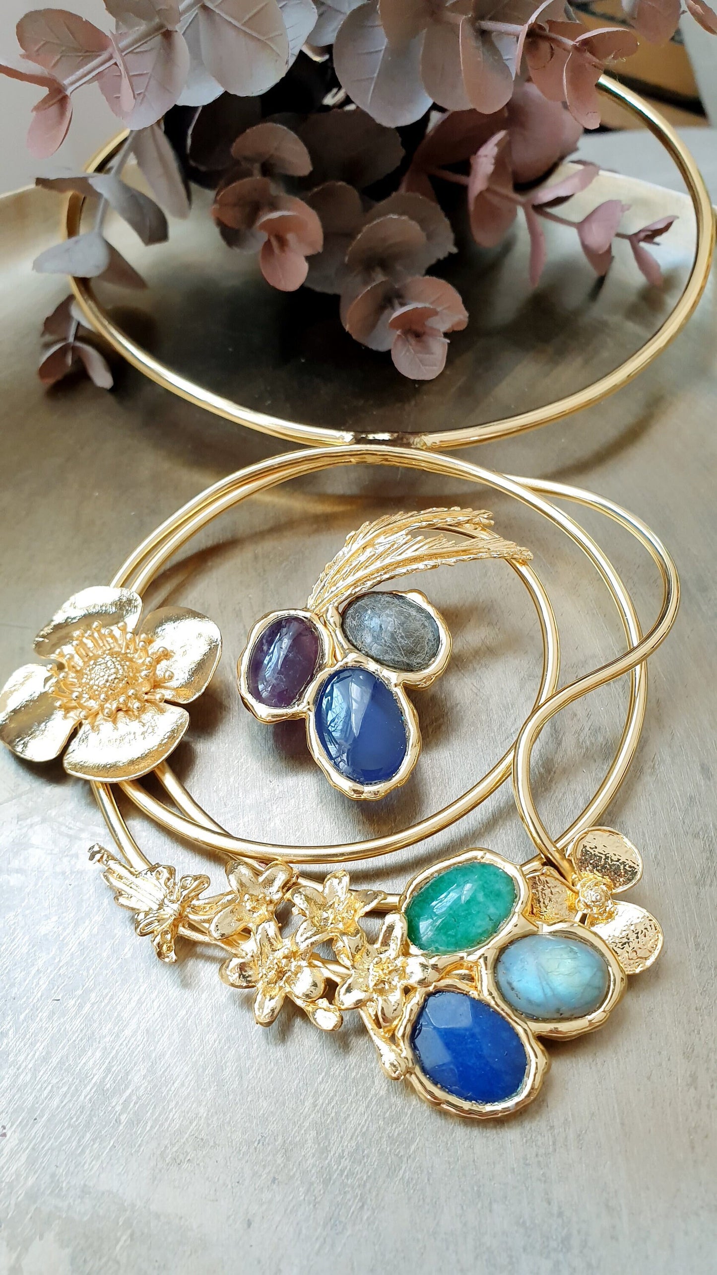 Gold plated necklace with hard stones.