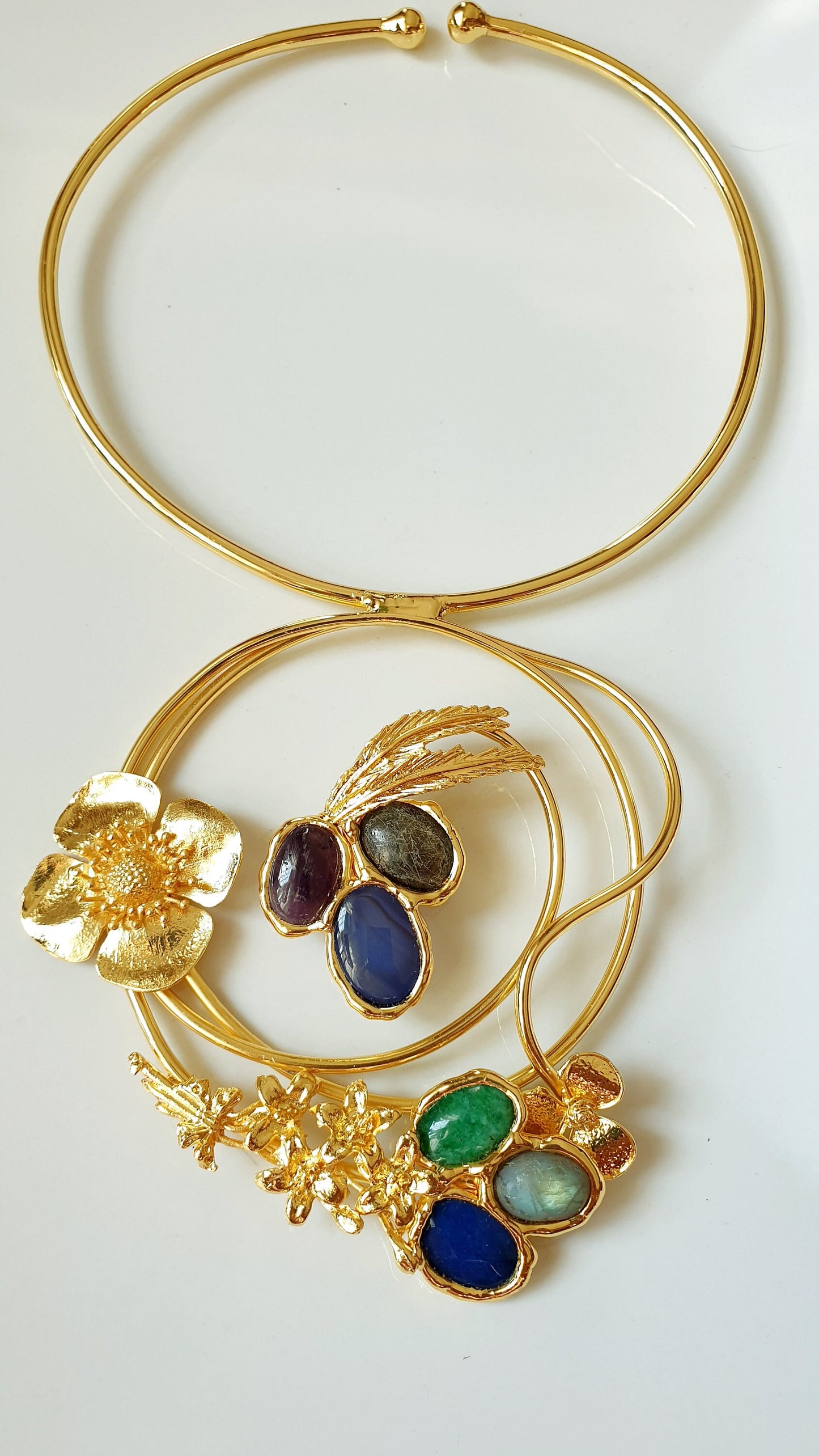Gold plated necklace with hard stones.