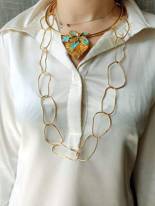 Long handmade gold plated necklace.