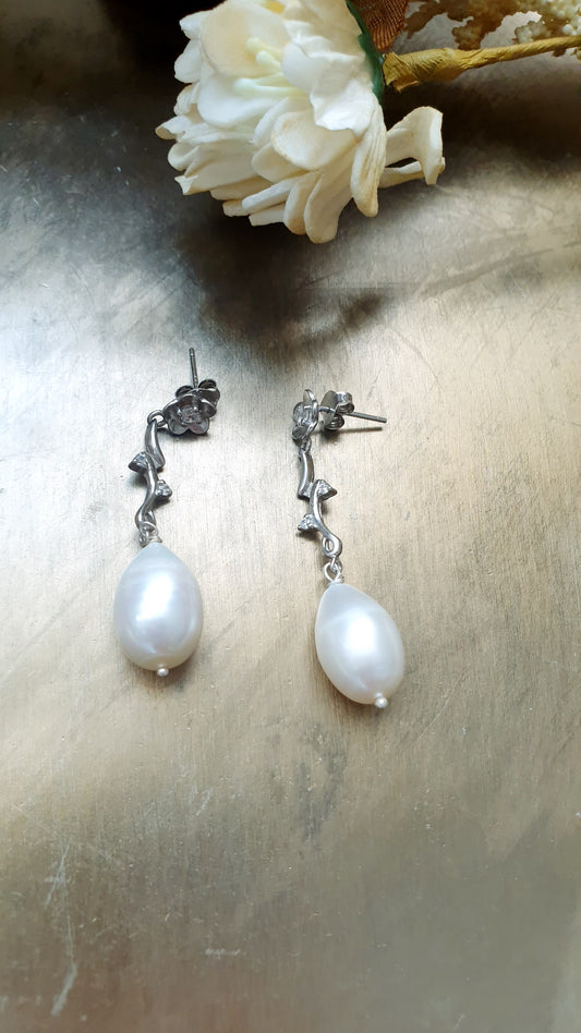 Orecchini in argento e zirconi con perle