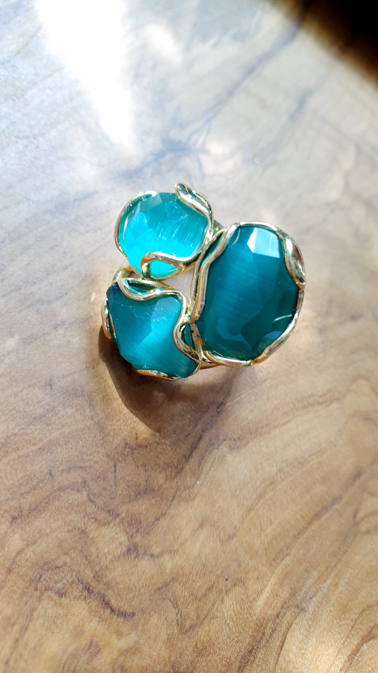 Anello regolabile in ottone con occhio di gatto