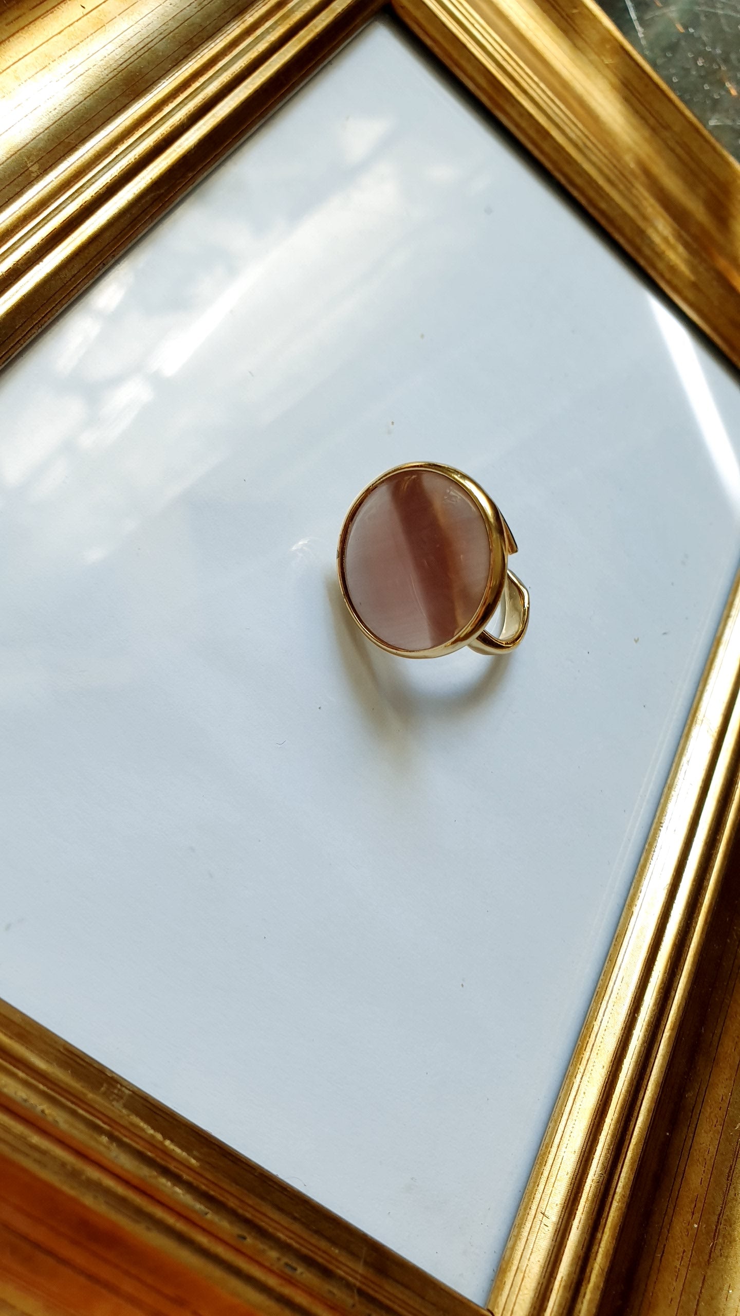 Anello regolabile con occhio di gatto rosa antico
