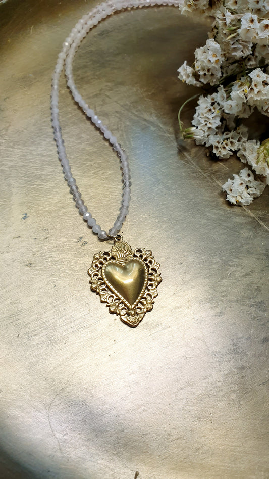 Girocollo in quarzo rosa con cuore sacro