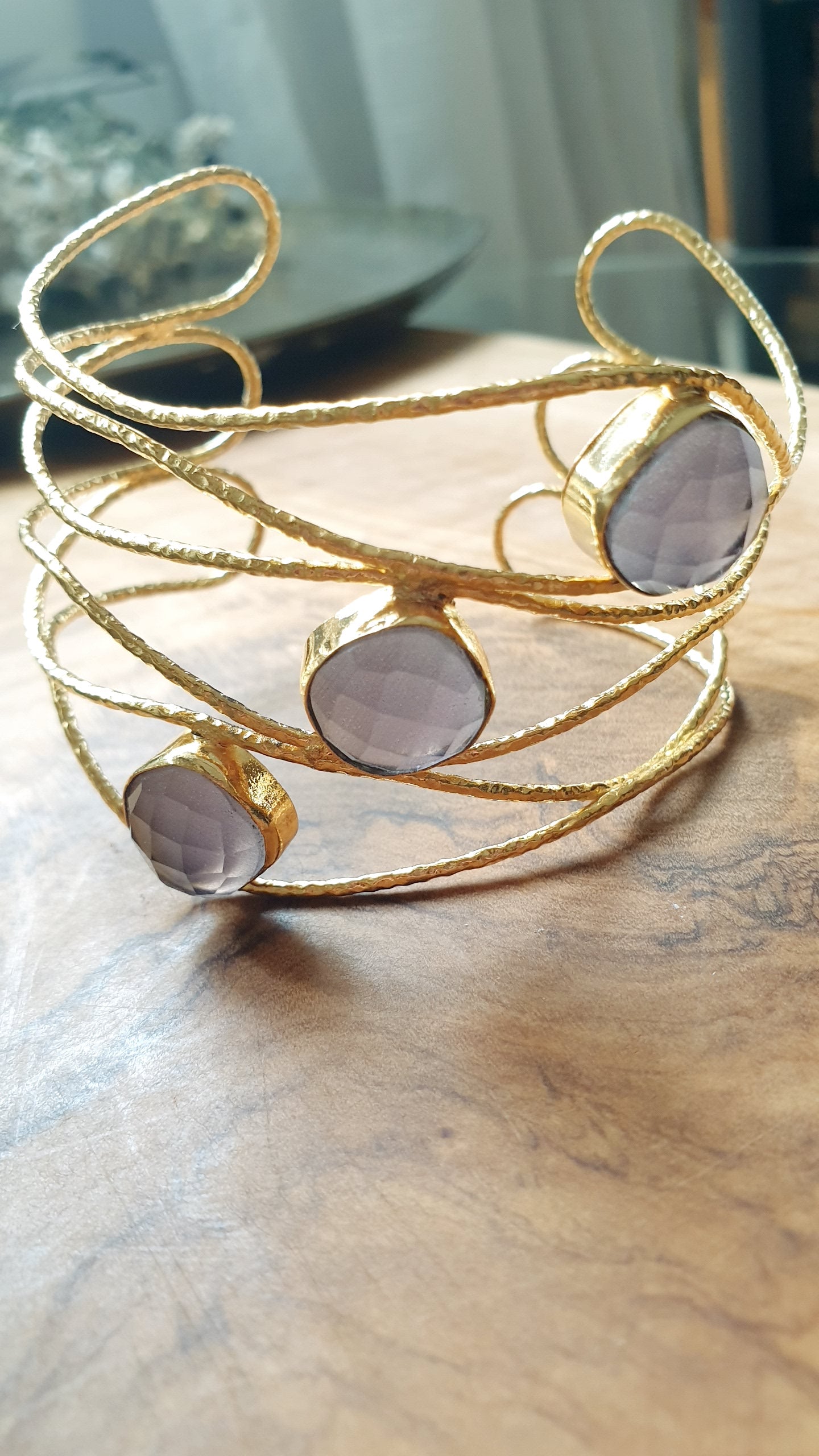 Bracciale a fascia in ottone con occhio di gatto