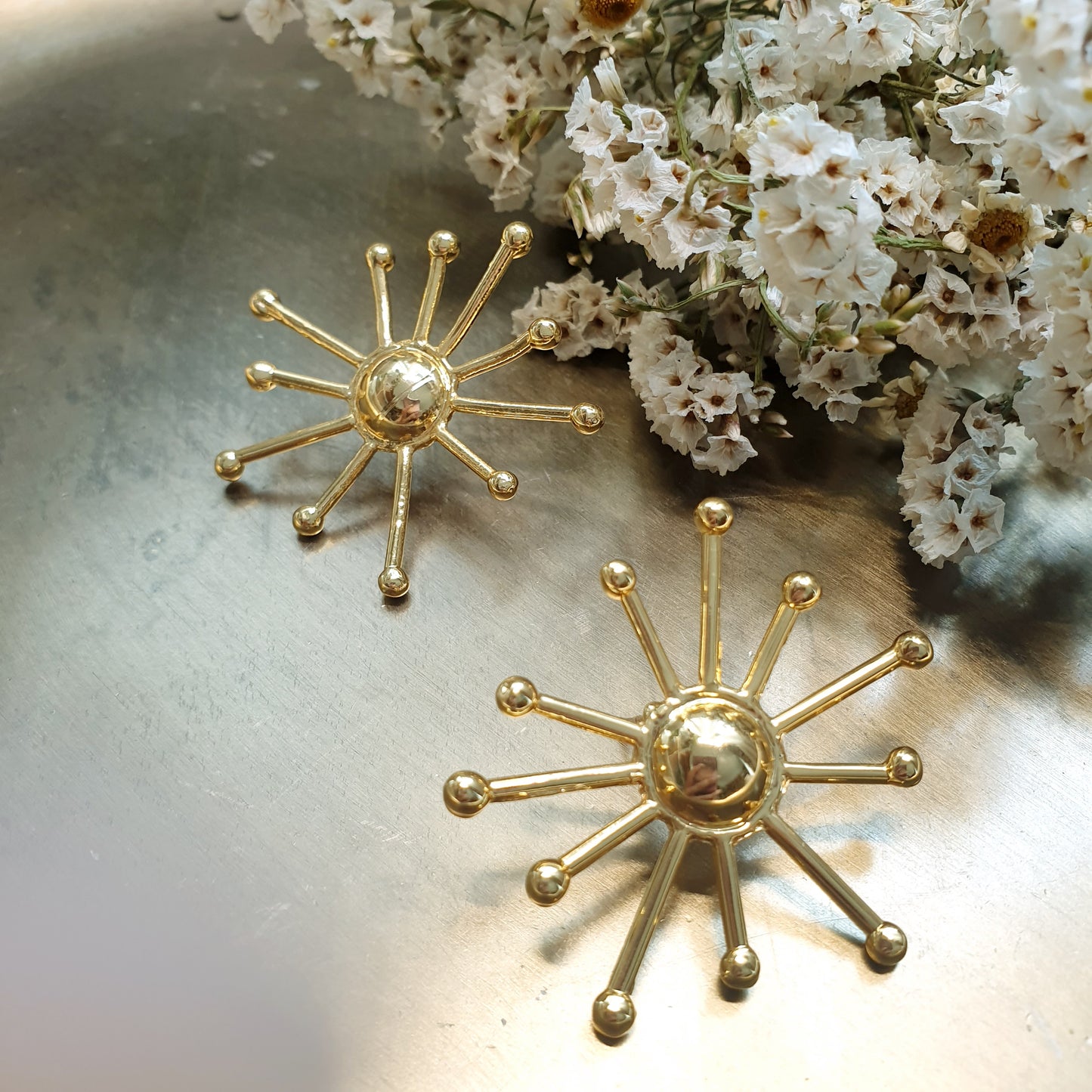 Orecchini sole in ottone