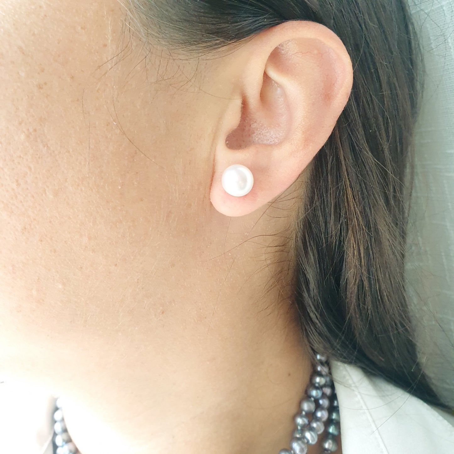 Orecchini a perno con perla di fiume