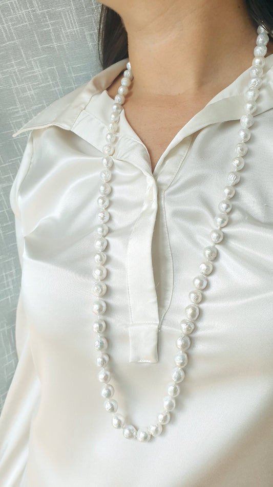 Lunga collana in perle barocche