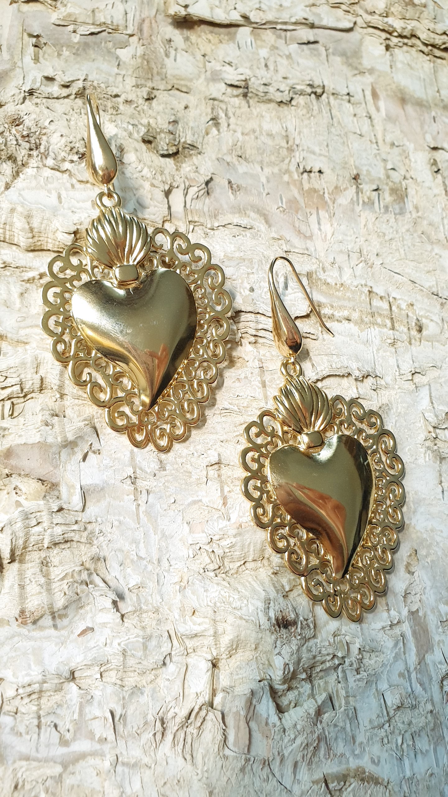 Grandi orecchini cuore sacro in acciaio