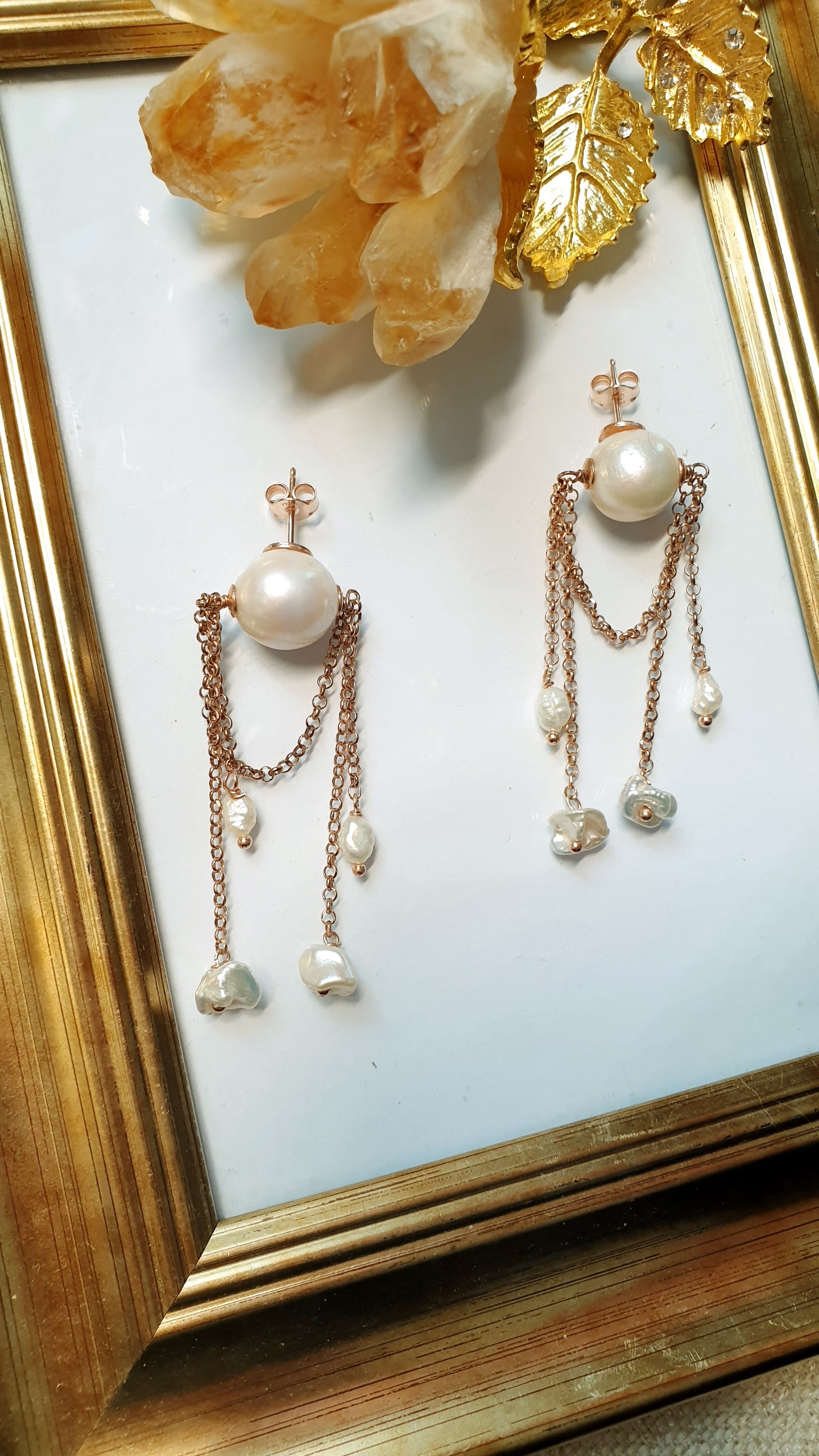 Orecchini in argento con perle barocche e fiume