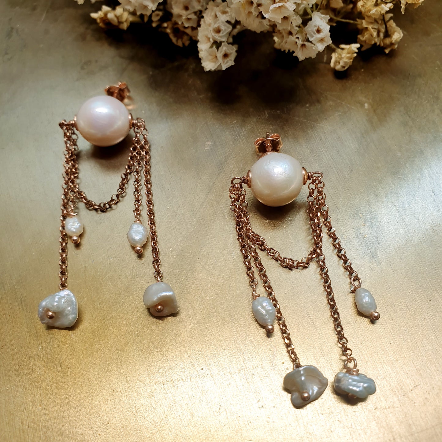 Orecchini in argento con perle barocche e fiume