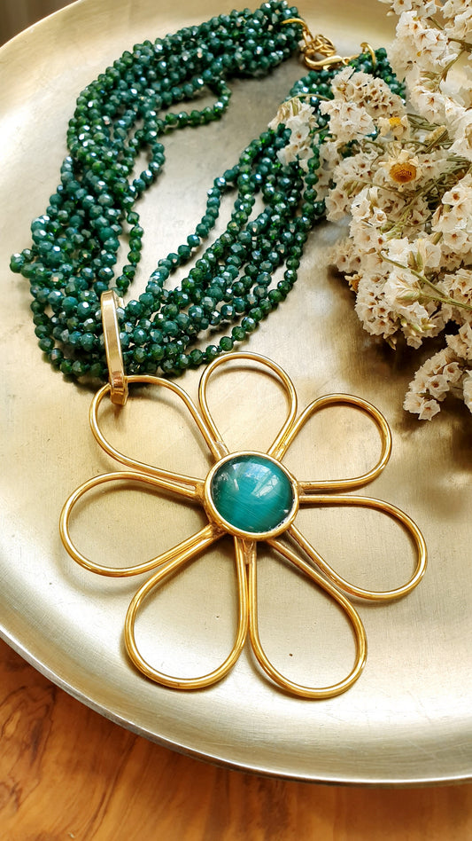 Girocollo di cristallini con fiore placcato oro e occhio di gatto