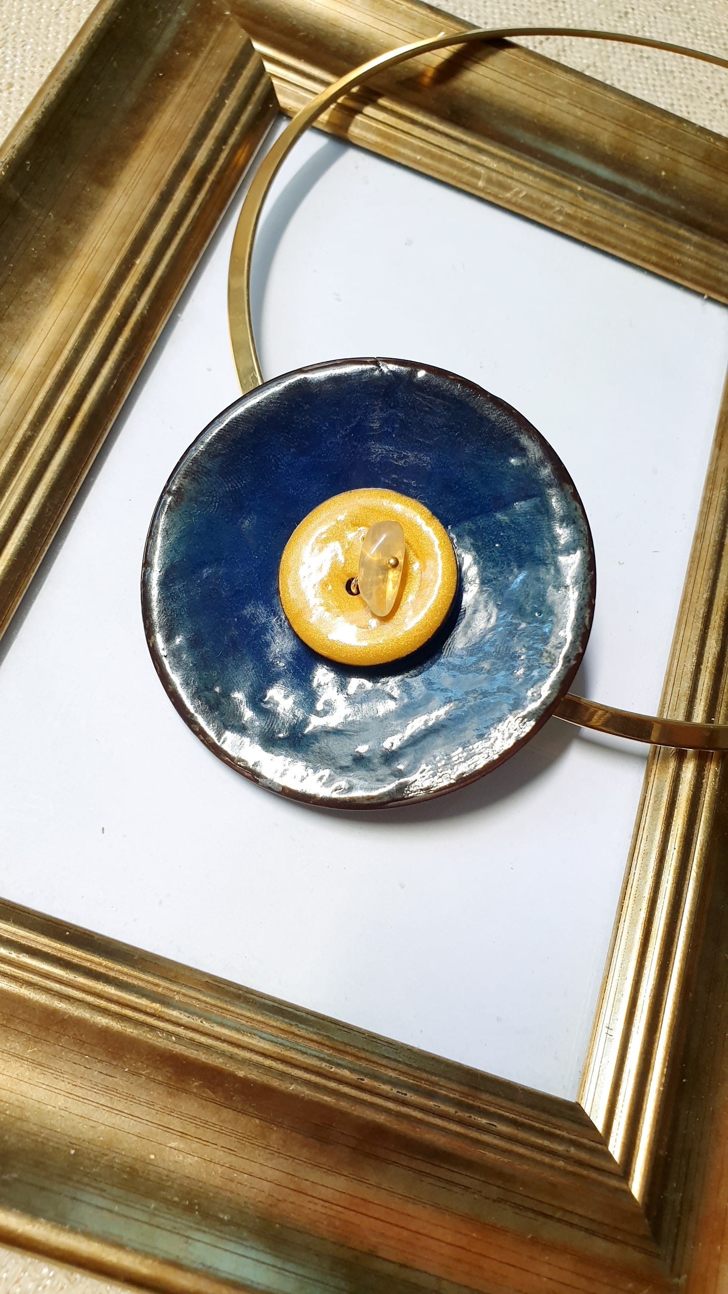 Girocollo in acciaio con dischi in semi laccati e chip di citrino