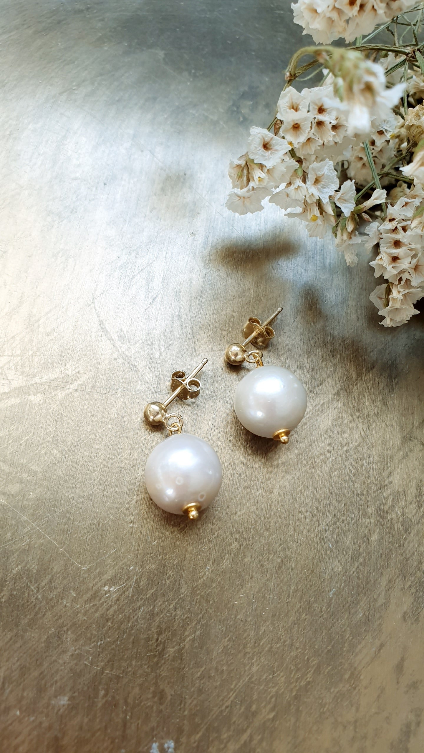 Orecchini in argento con perla barocca