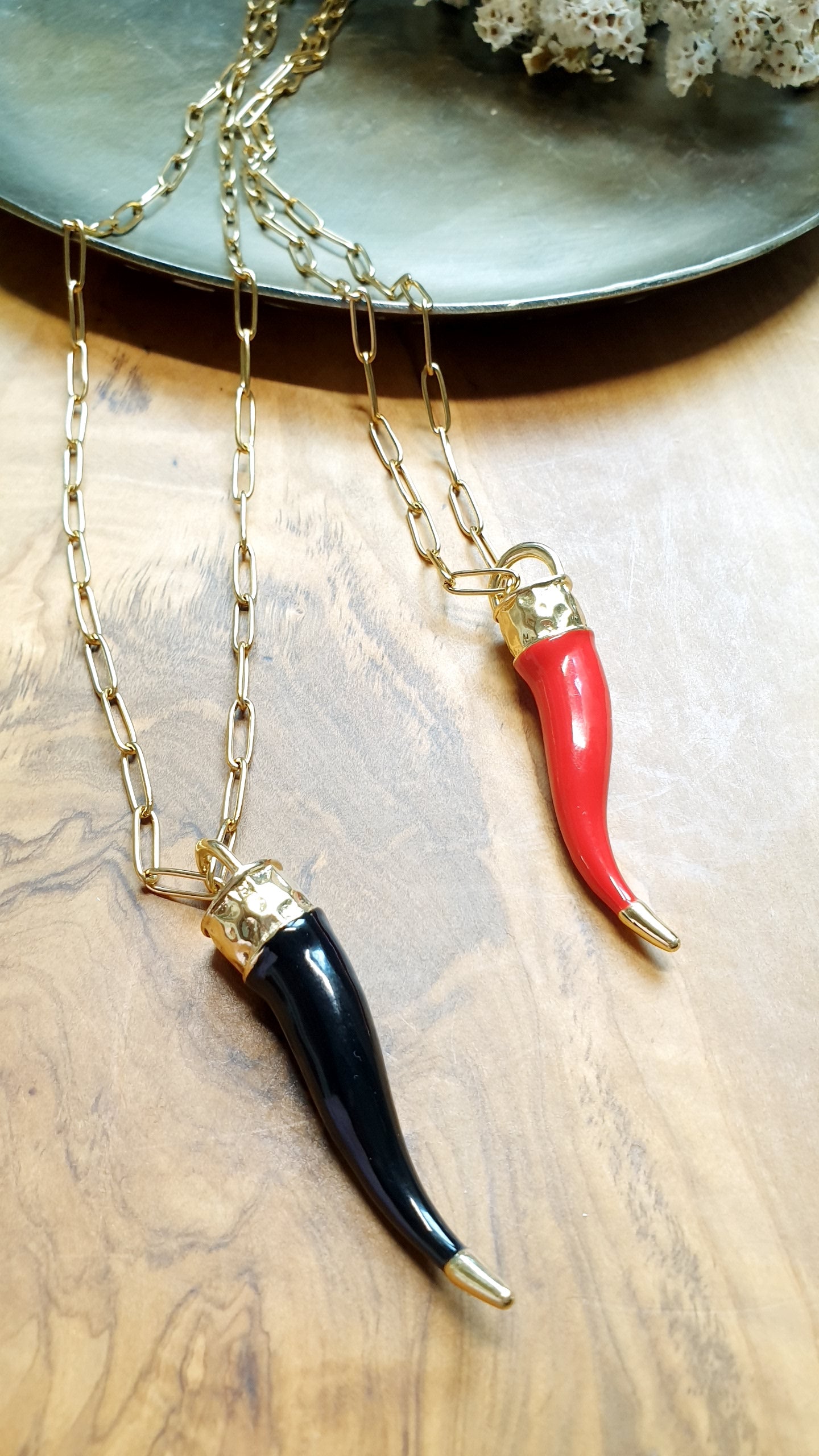 Collana in acciaio con corno in ceramica