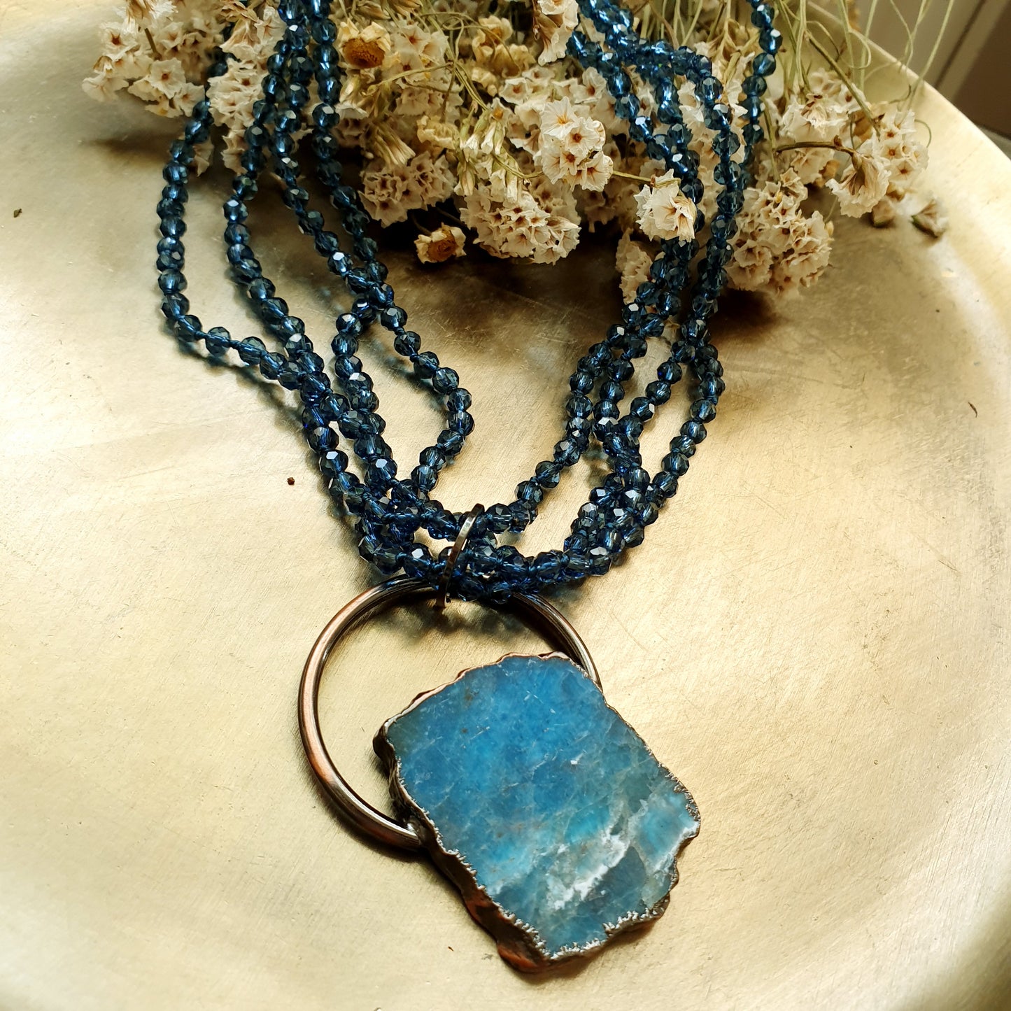 Girodollo di cristallini con apatite