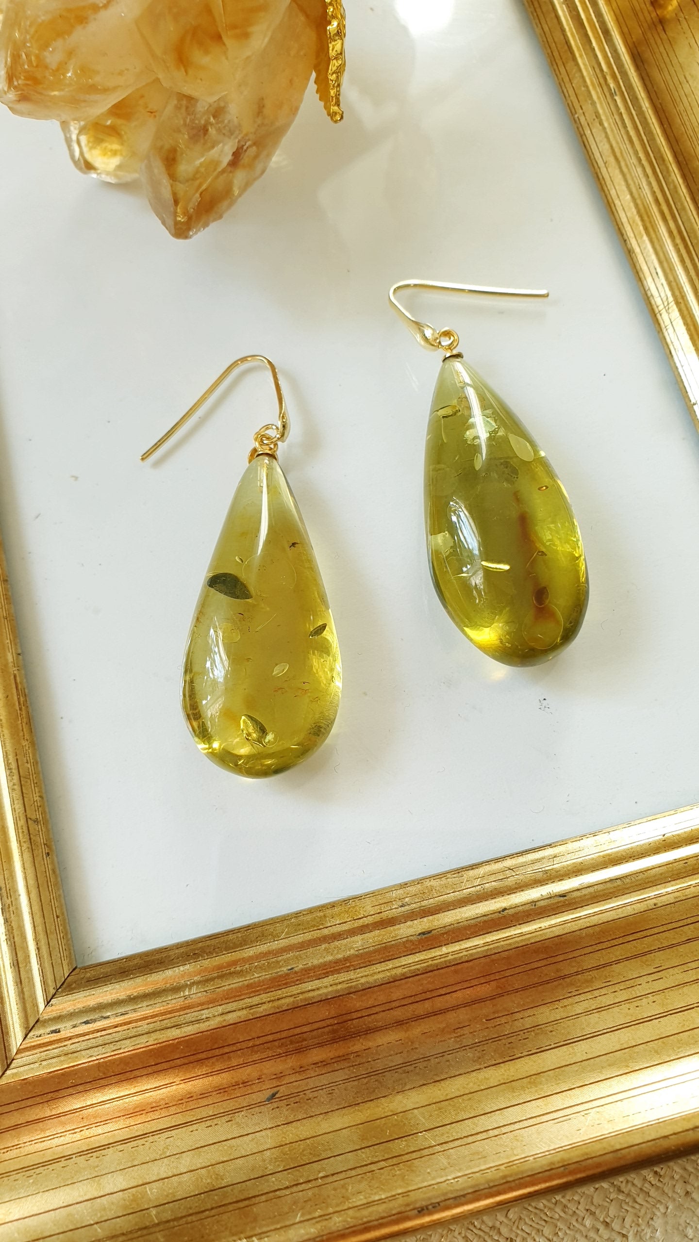 Orecchini in argento e ambra verde