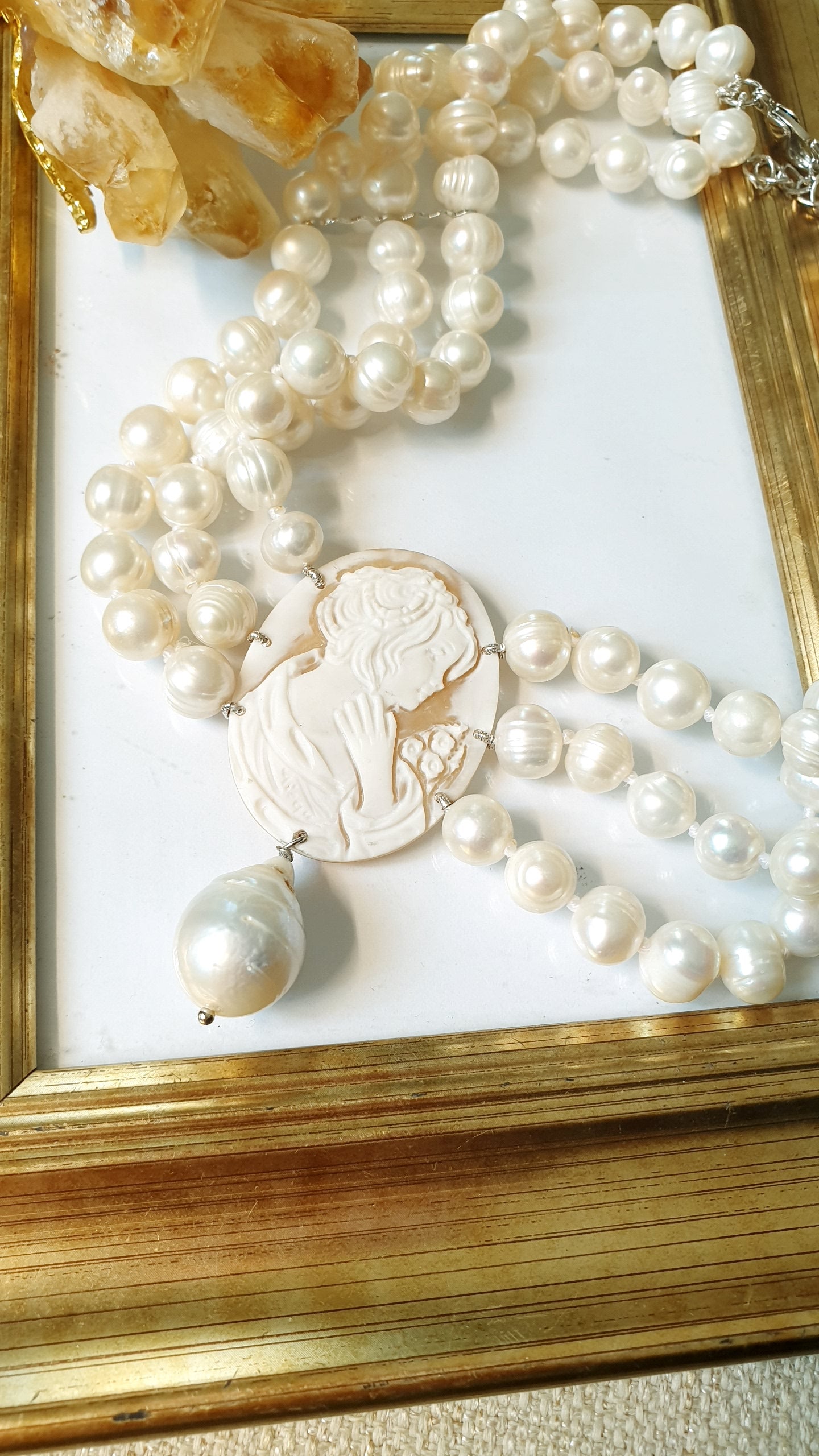 Three-strand pearl choker with engraved cameo and baroque pearl. One of a kind