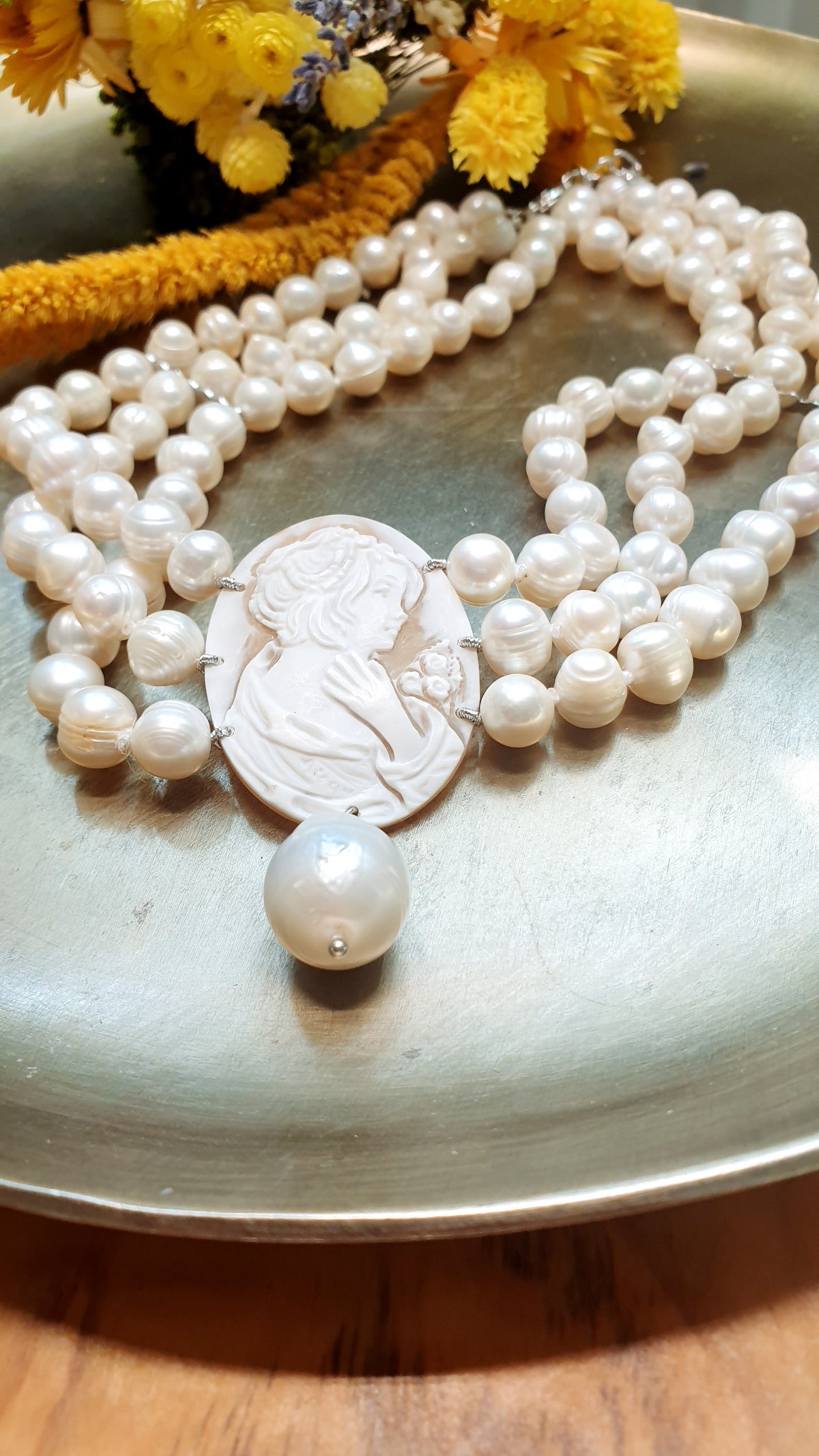 Three-strand pearl choker with engraved cameo and baroque pearl. One of a kind