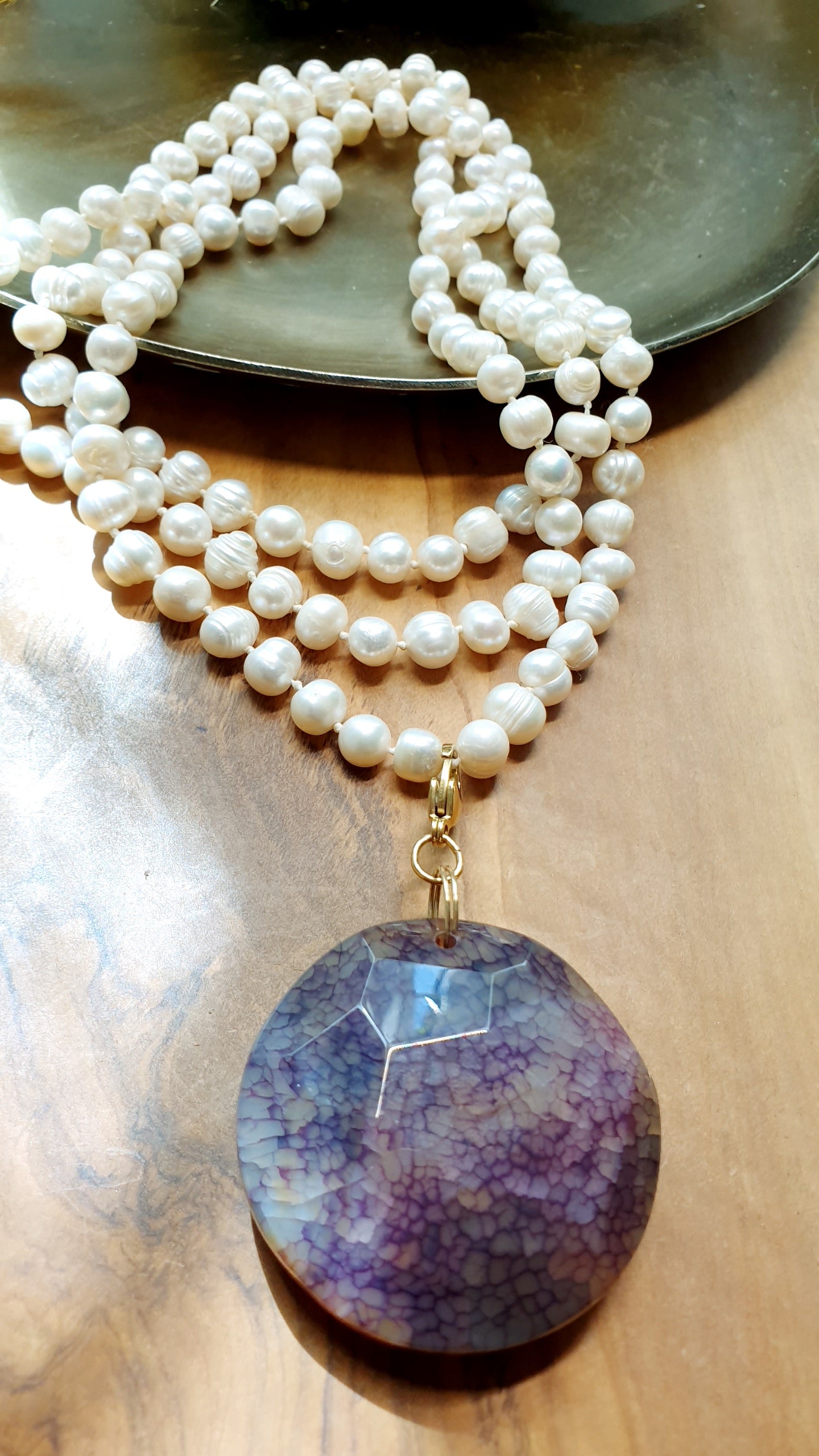 Lunga collana di perle con drusa di agata
