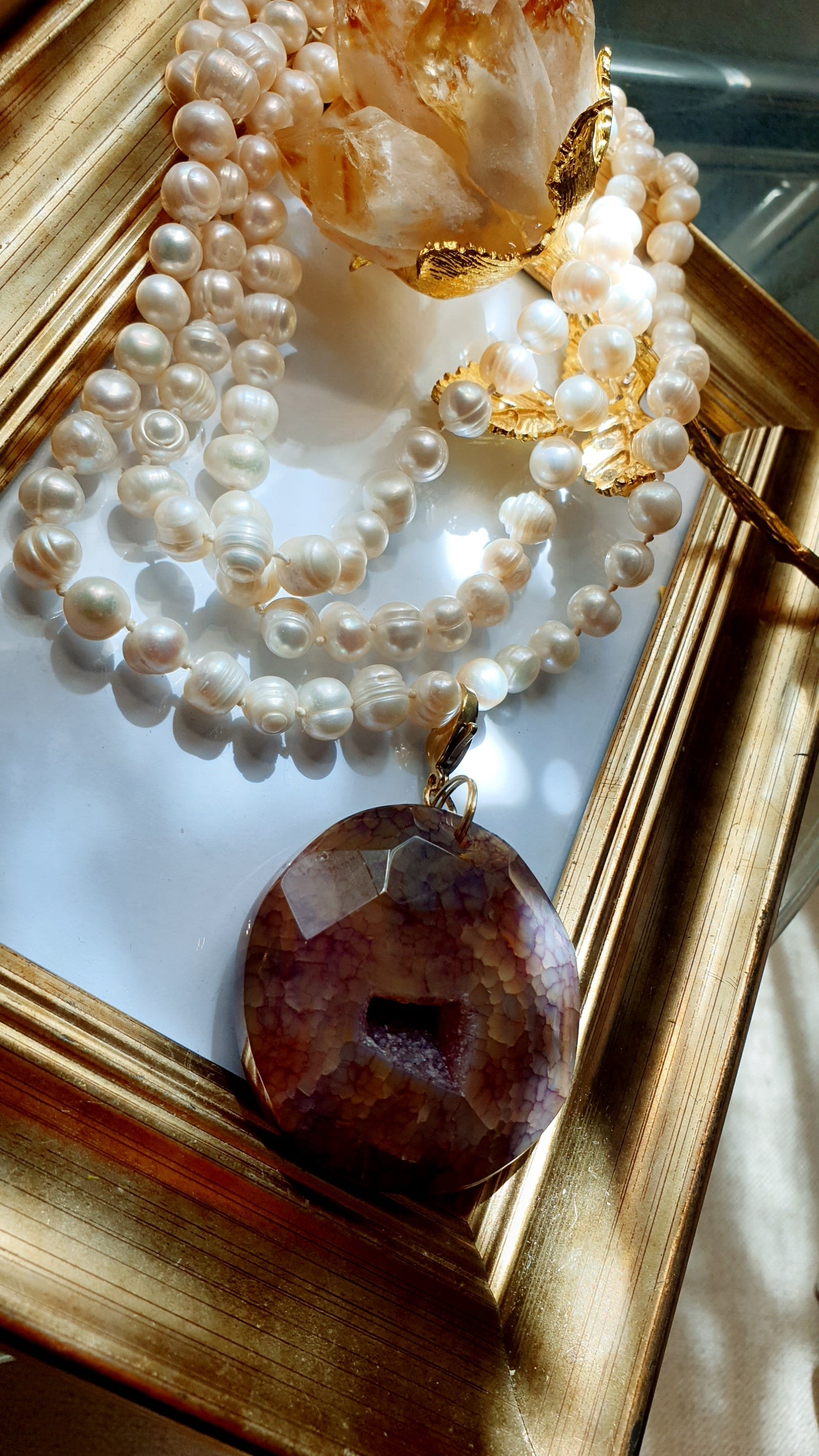 Lunga collana di perle con drusa di agata