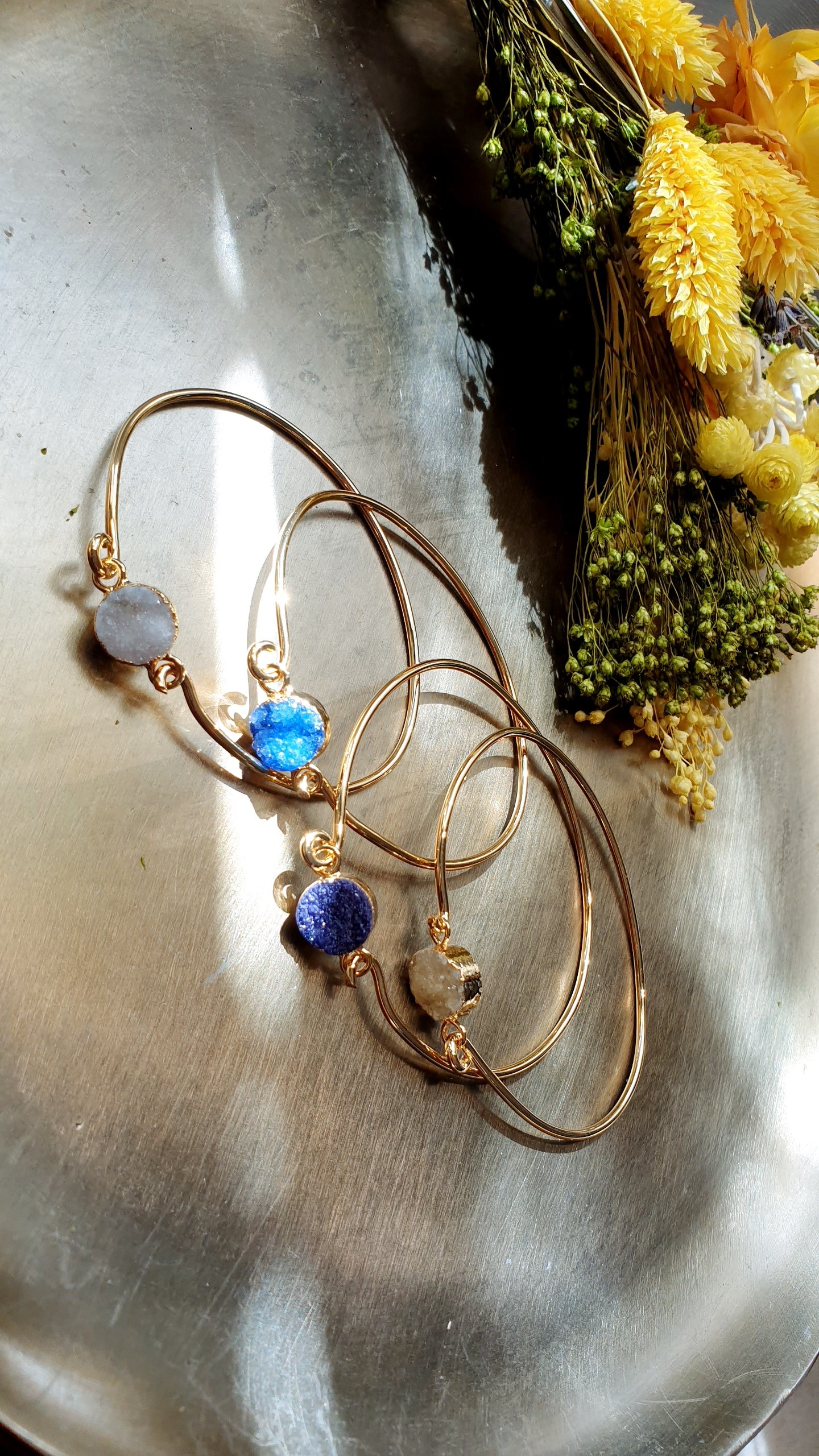 Bracciali placcati oro con druse di quarzo