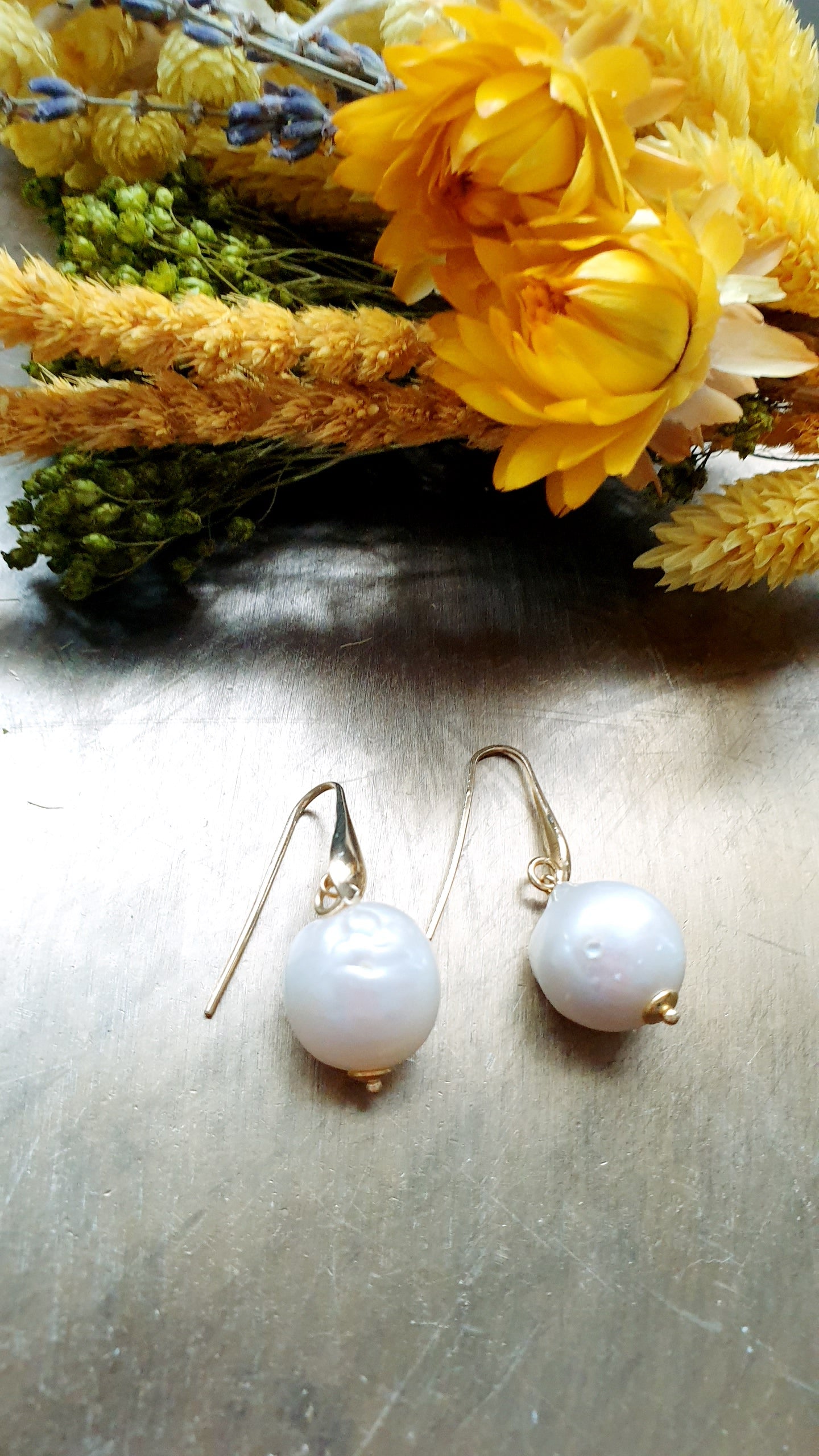 Orecchini in argento con perla barocca