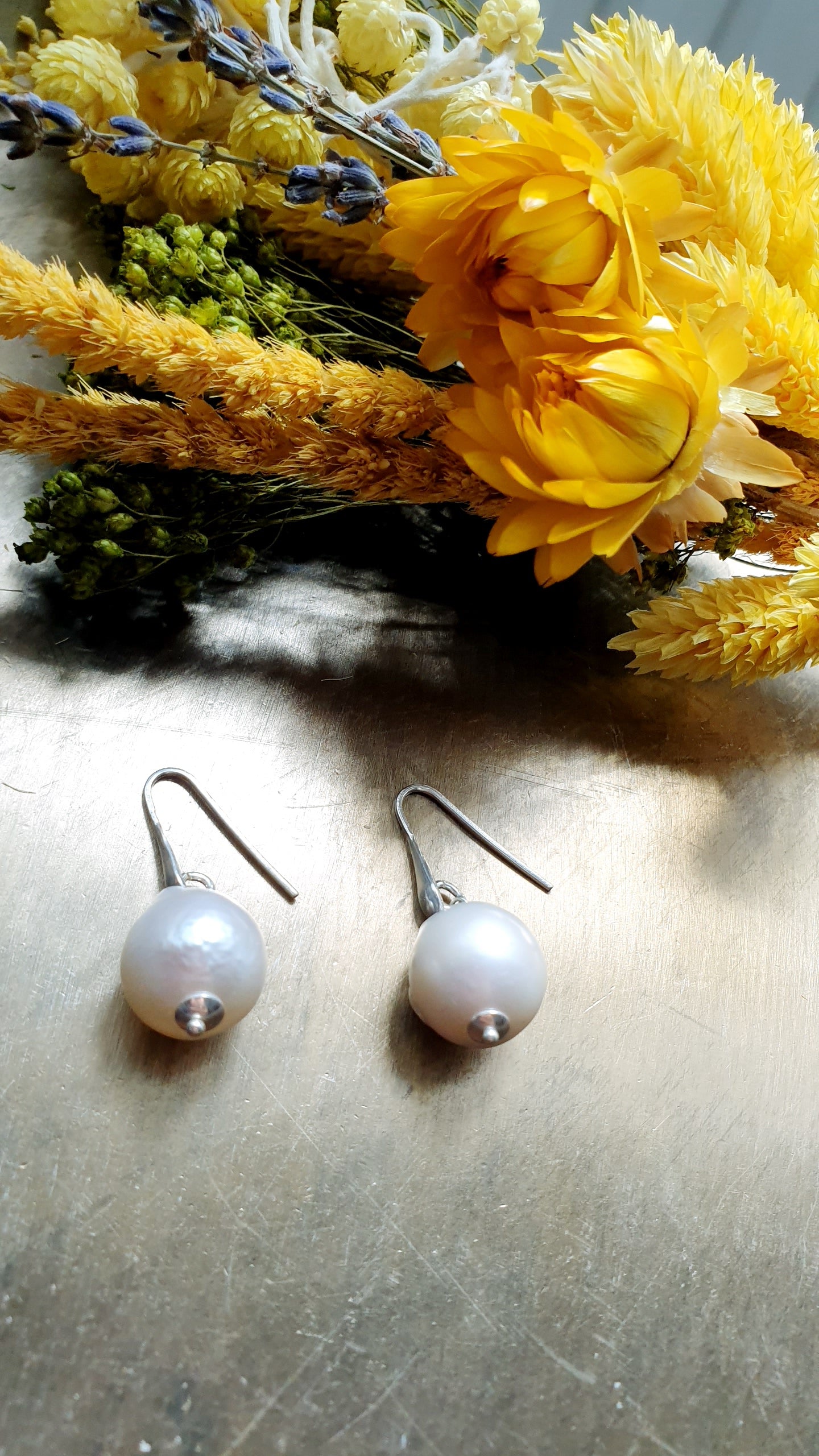 Orecchini in argento con perla barocca