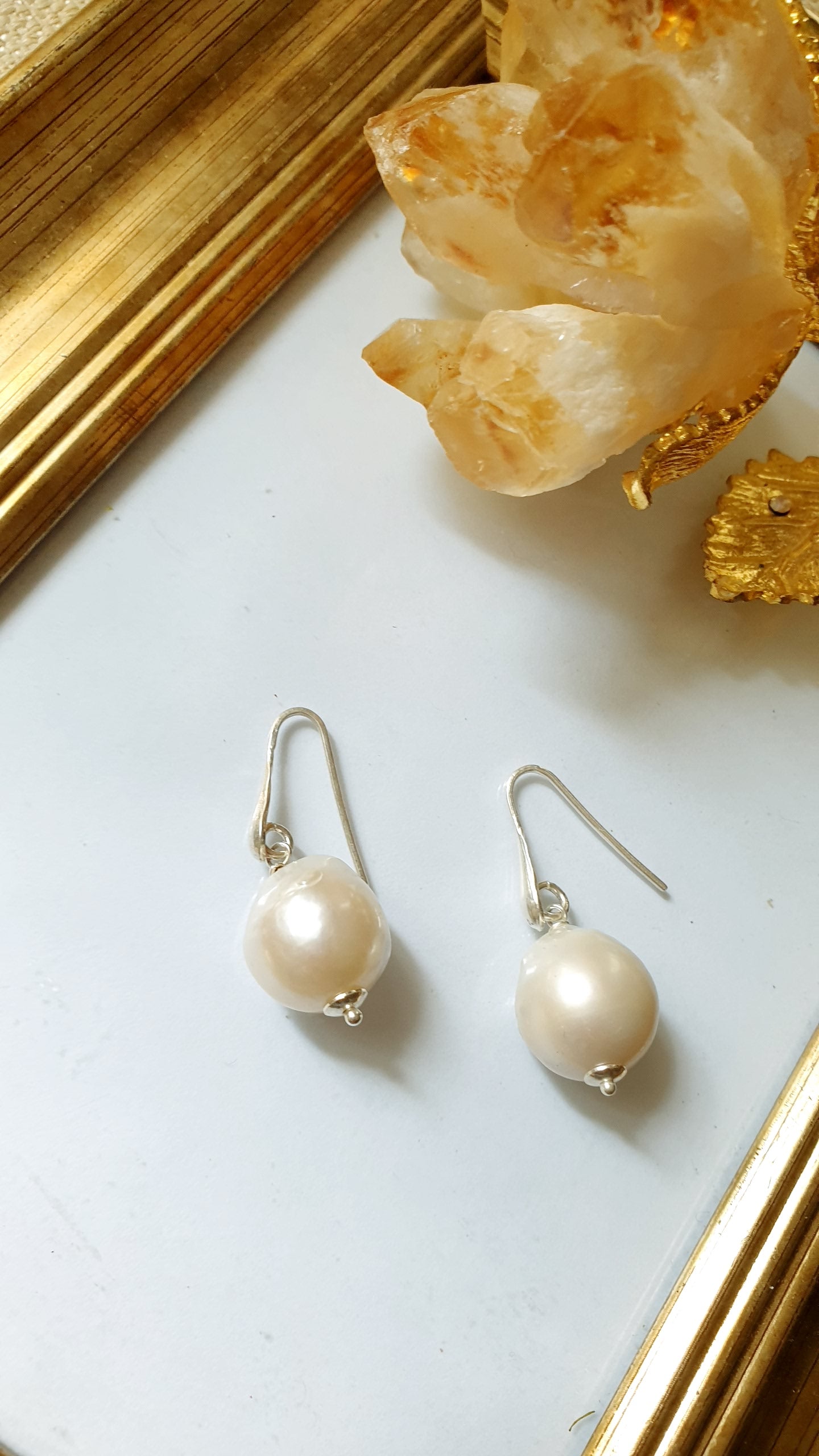 Orecchini in argento con perla barocca