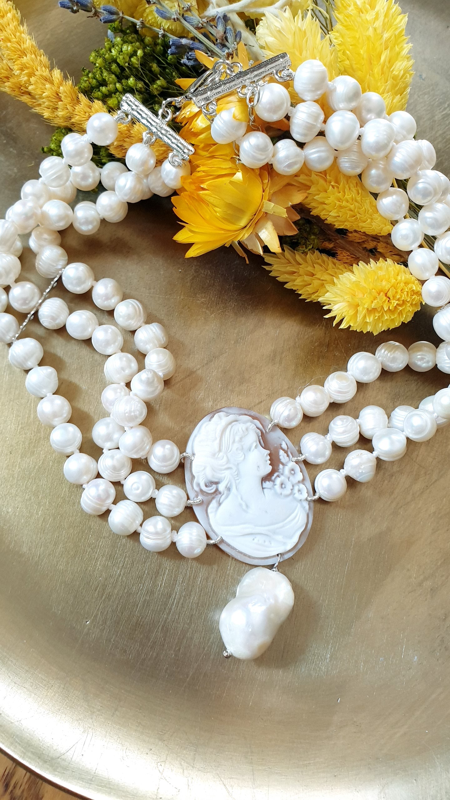 Three-strand pearl choker with engraved cameo and baroque pearl. One of a kind