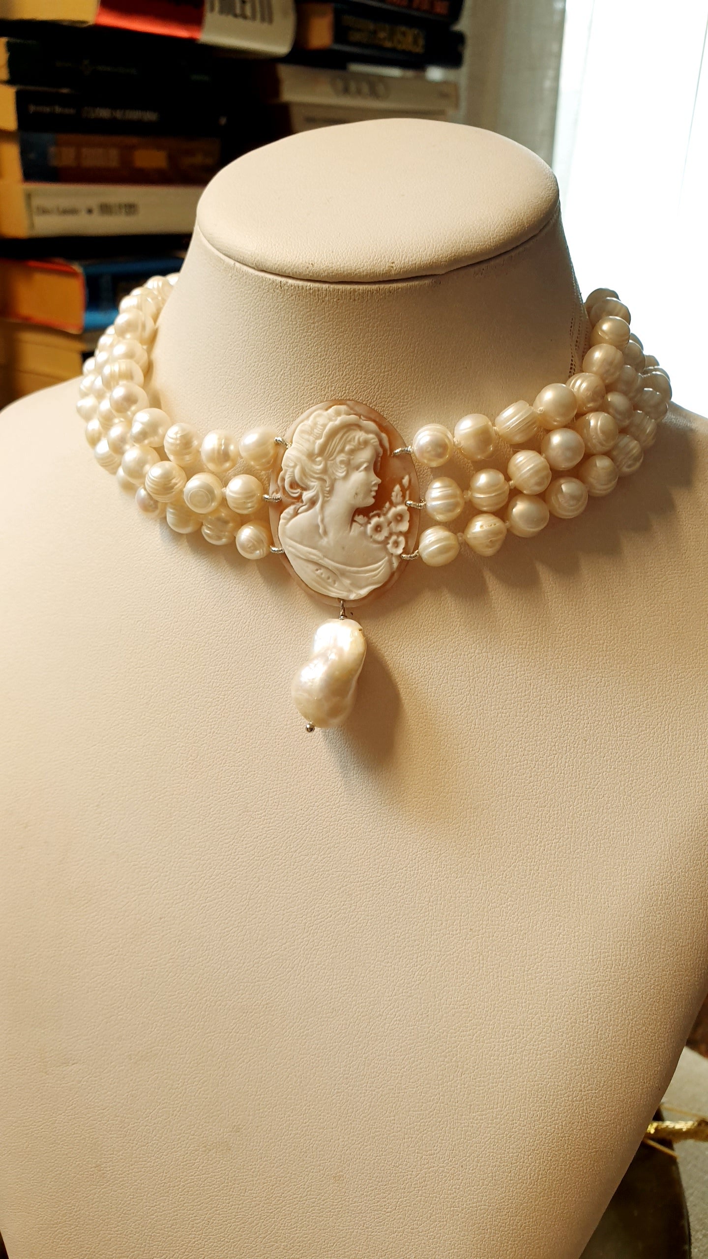 Three-strand pearl choker with engraved cameo and baroque pearl. One of a kind