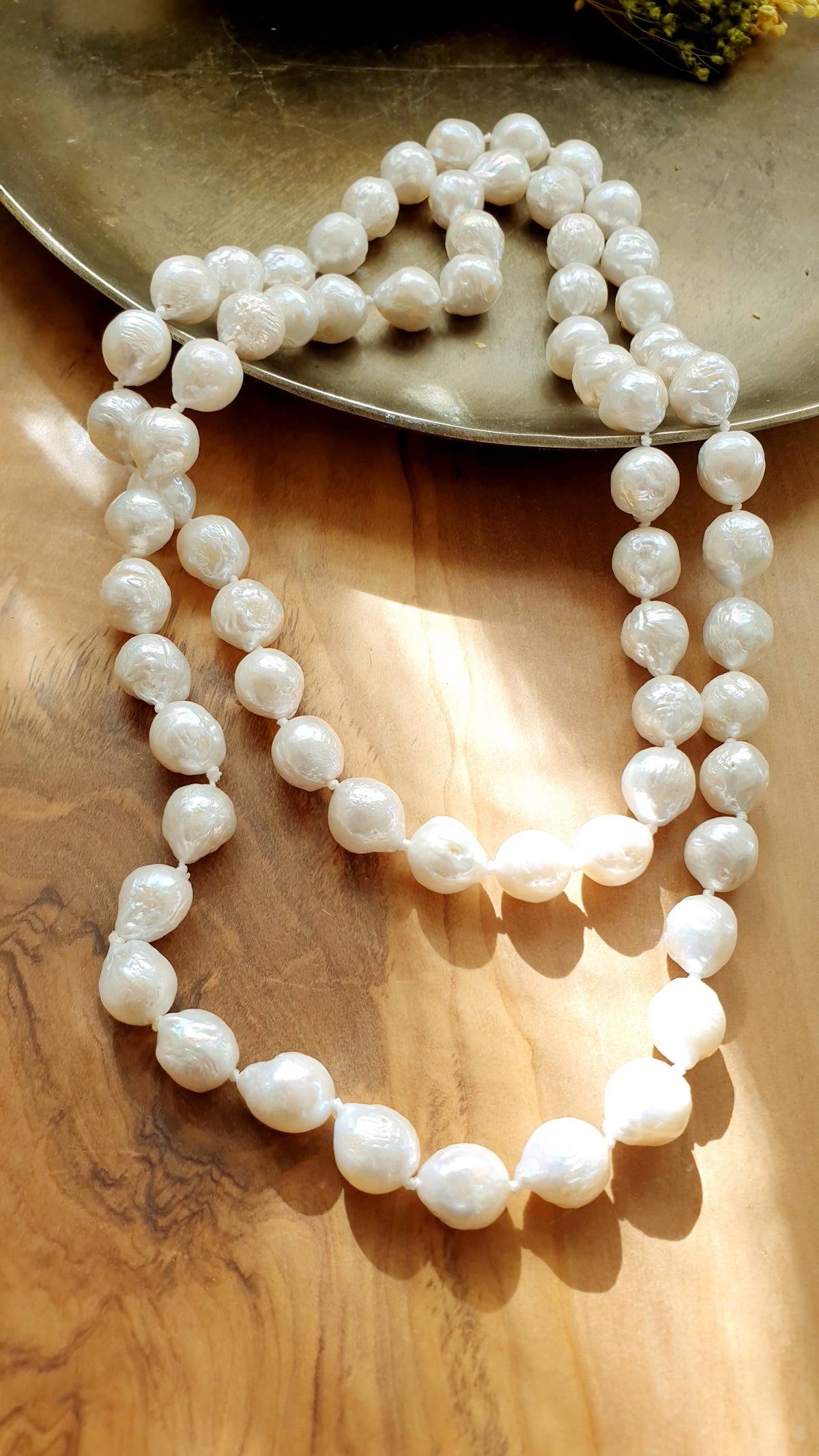 Collana lunga con perle scaramazze