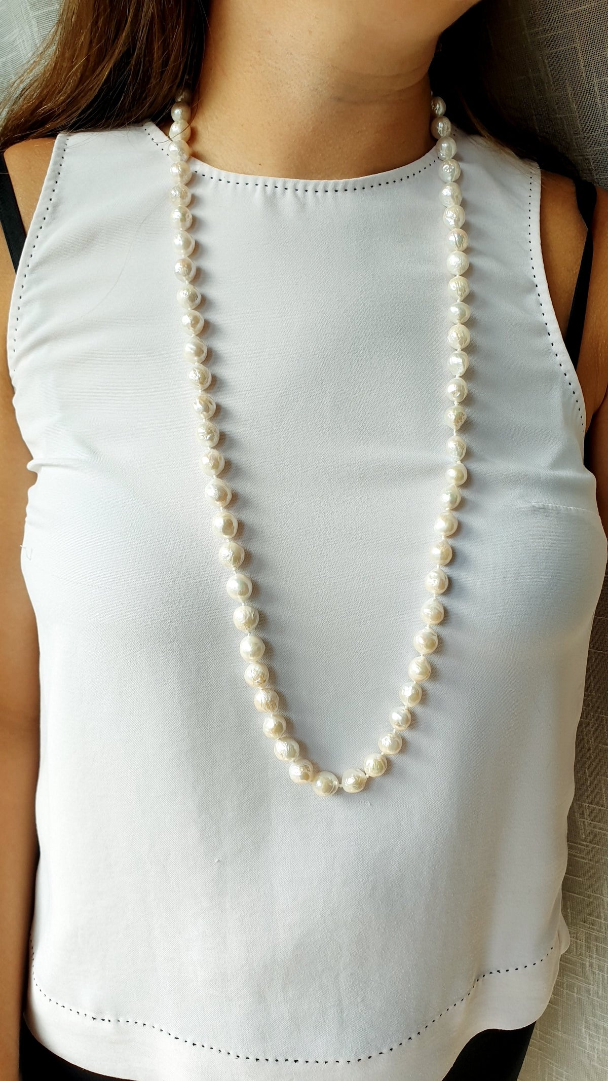 Collana lunga con perle scaramazze